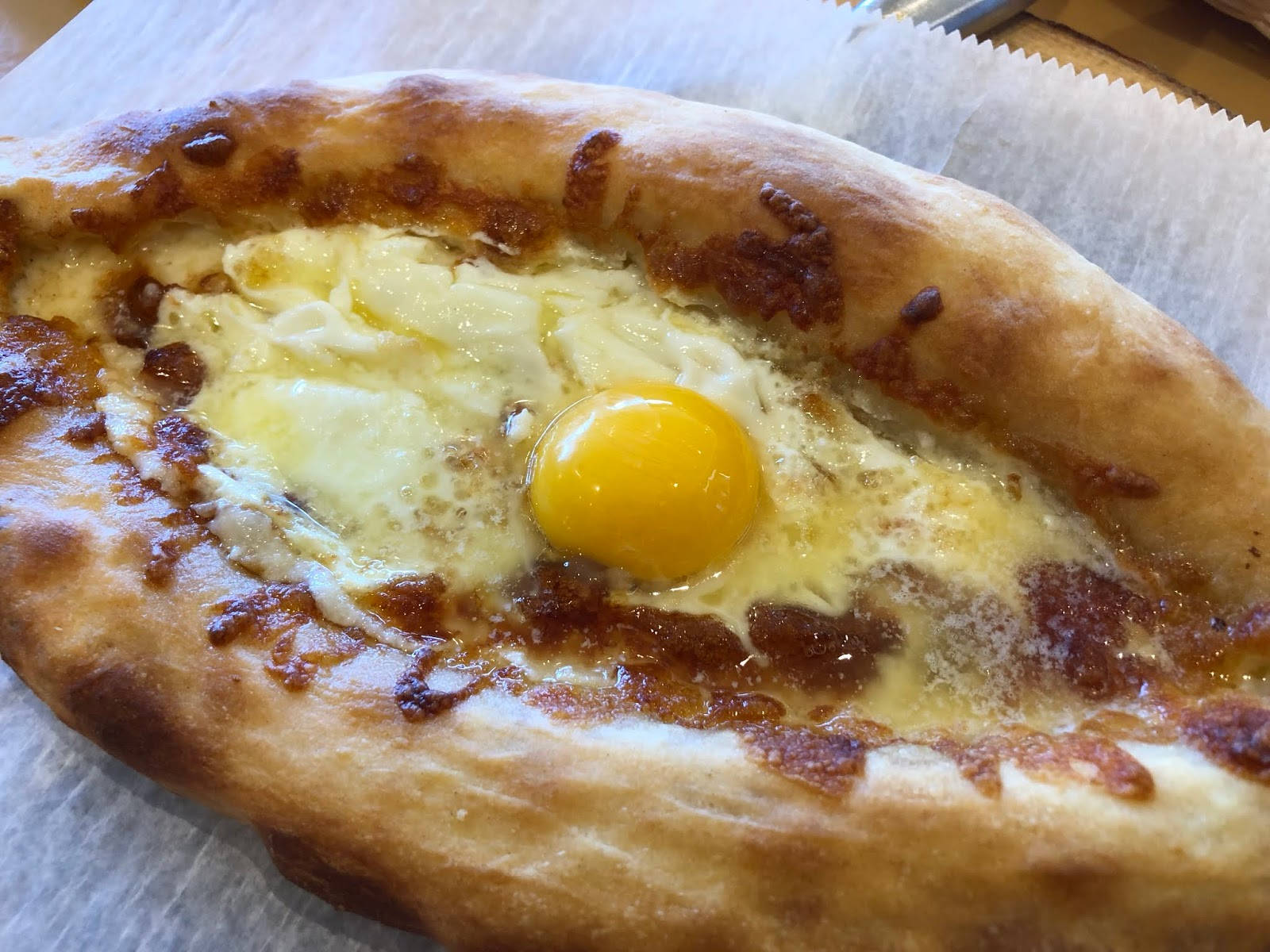 Georgian Khachapuri Dish With Fresh Egg Background