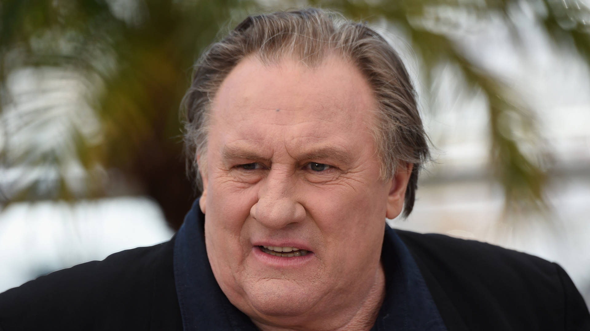 Gérard Depardieu Confused Expression Background