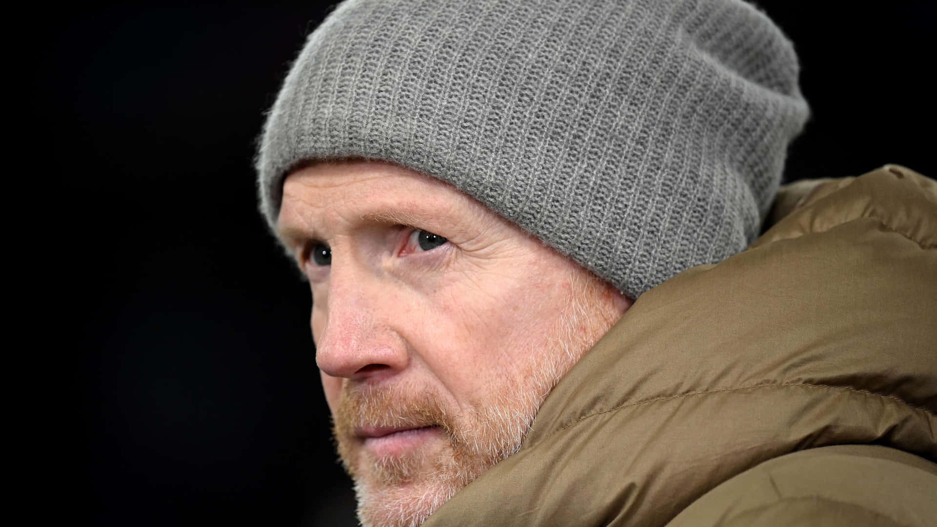 German Football Official Matthias Sammer Wearing A Beanie Background