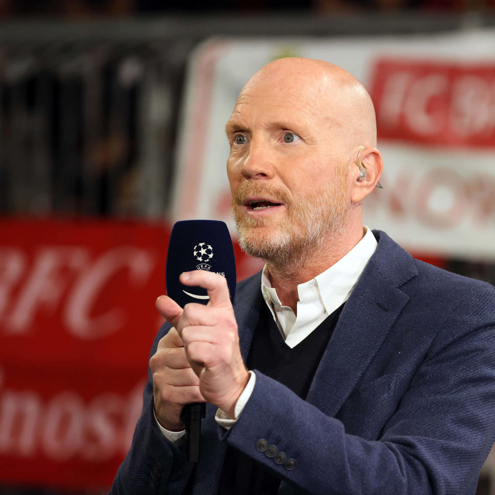 German Football Official Matthias Sammer Wearing A Suit Background