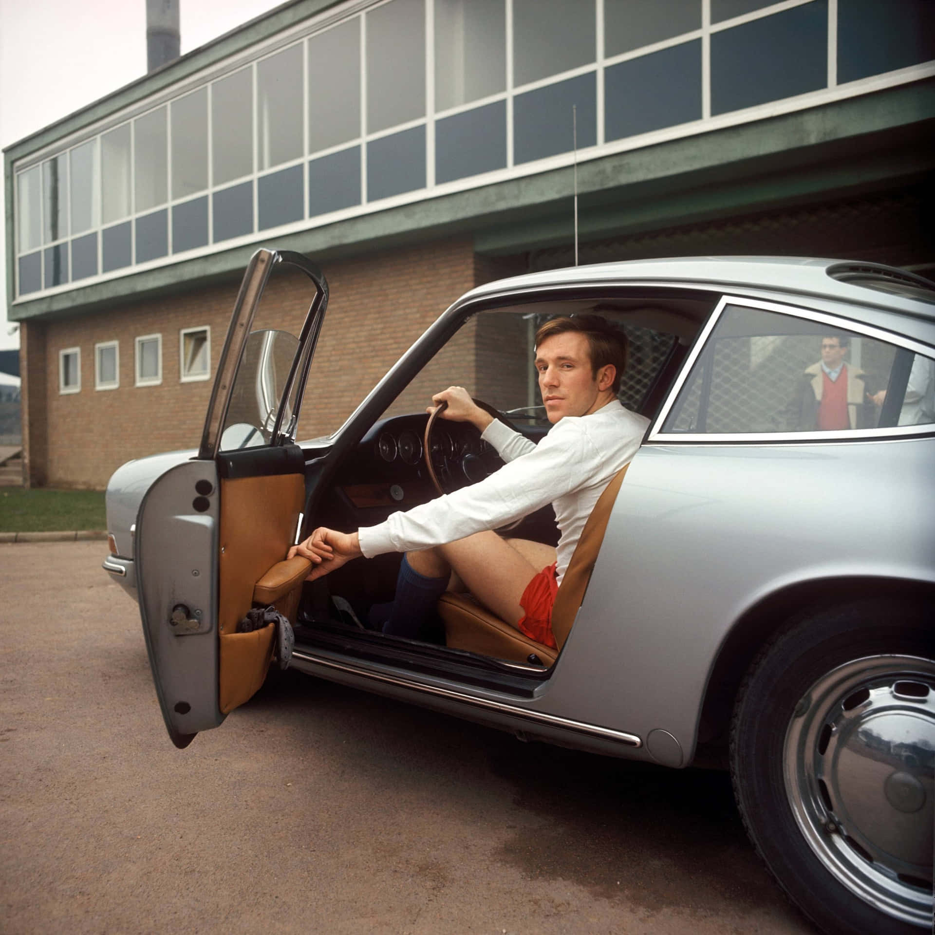 German Football Star Günter Netzer With Vintage Porsche Car Background
