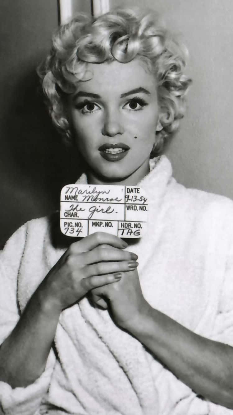 Get Glamorous With Marilyn Monroe On Your Iphone Background