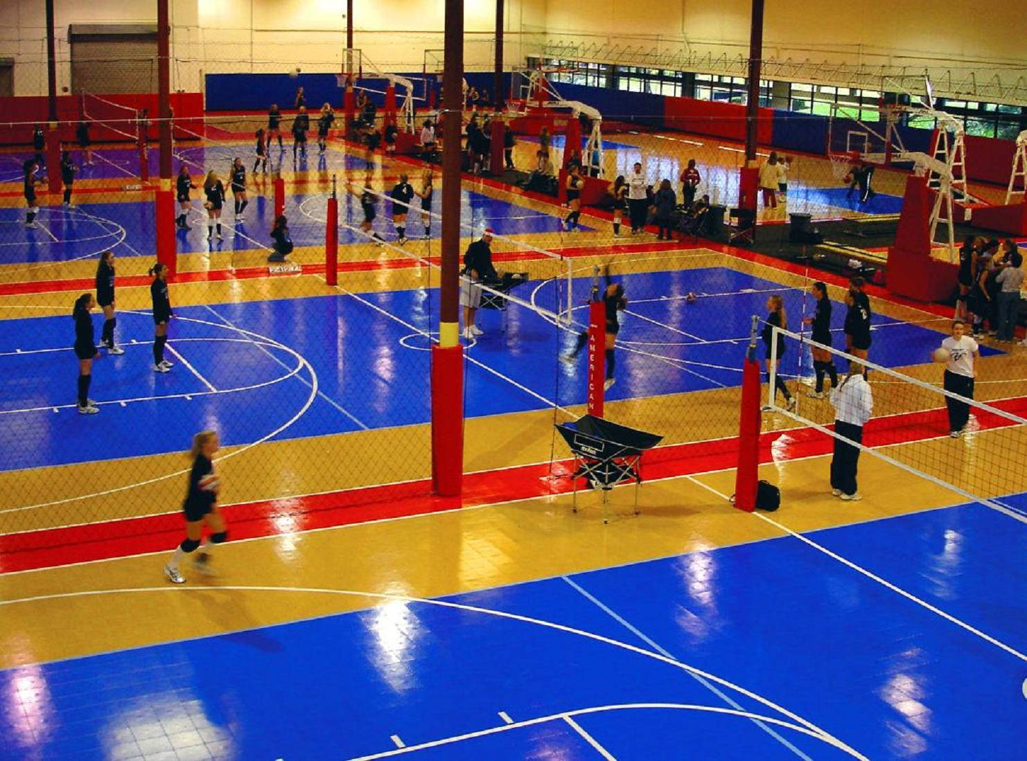 Get Ready For Game Day And Make Your Dibs On The Court For An Indoor Volleyball Match. Background