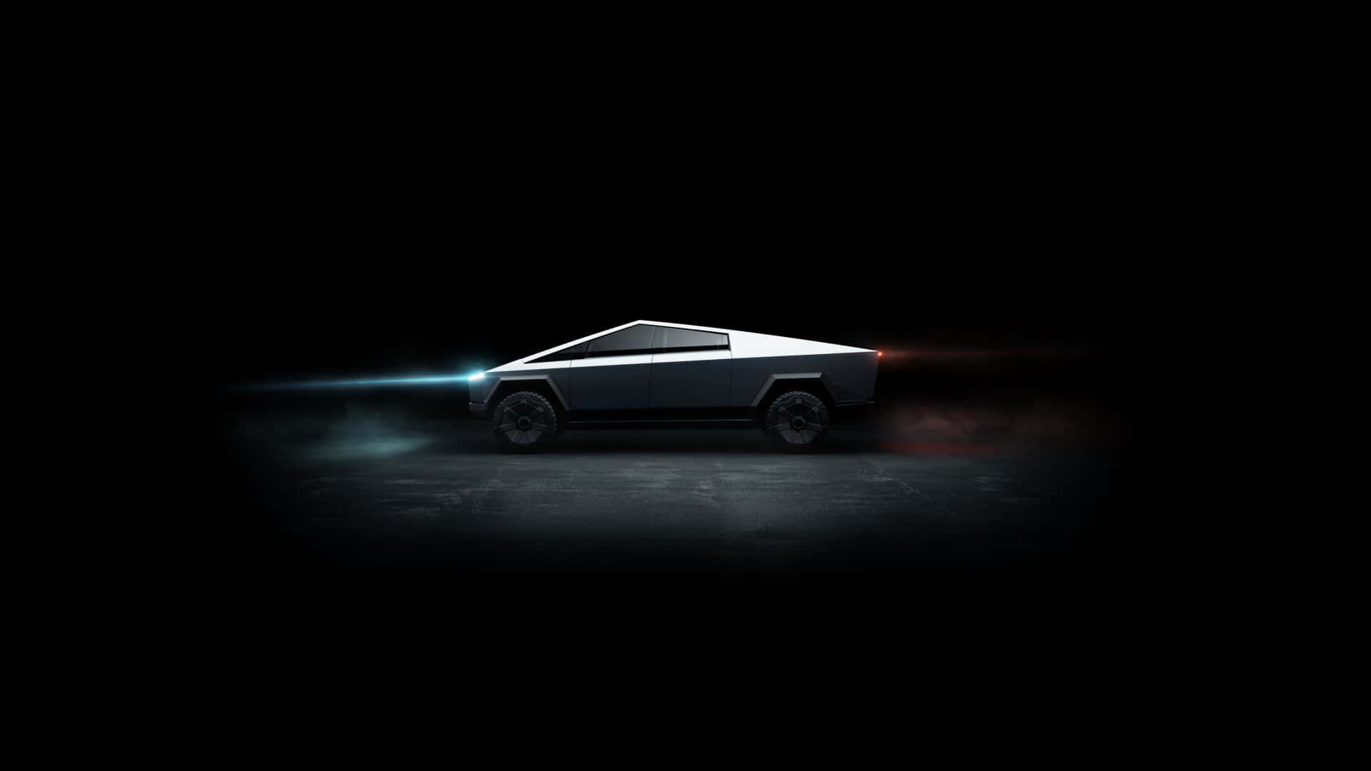 Get Ready To Take A Ride In The Stylish Tesla Cybertruck Background