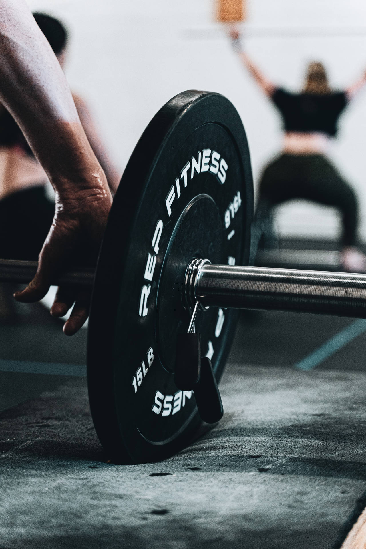 Get Stronger - Working Out With Weight Plates Background