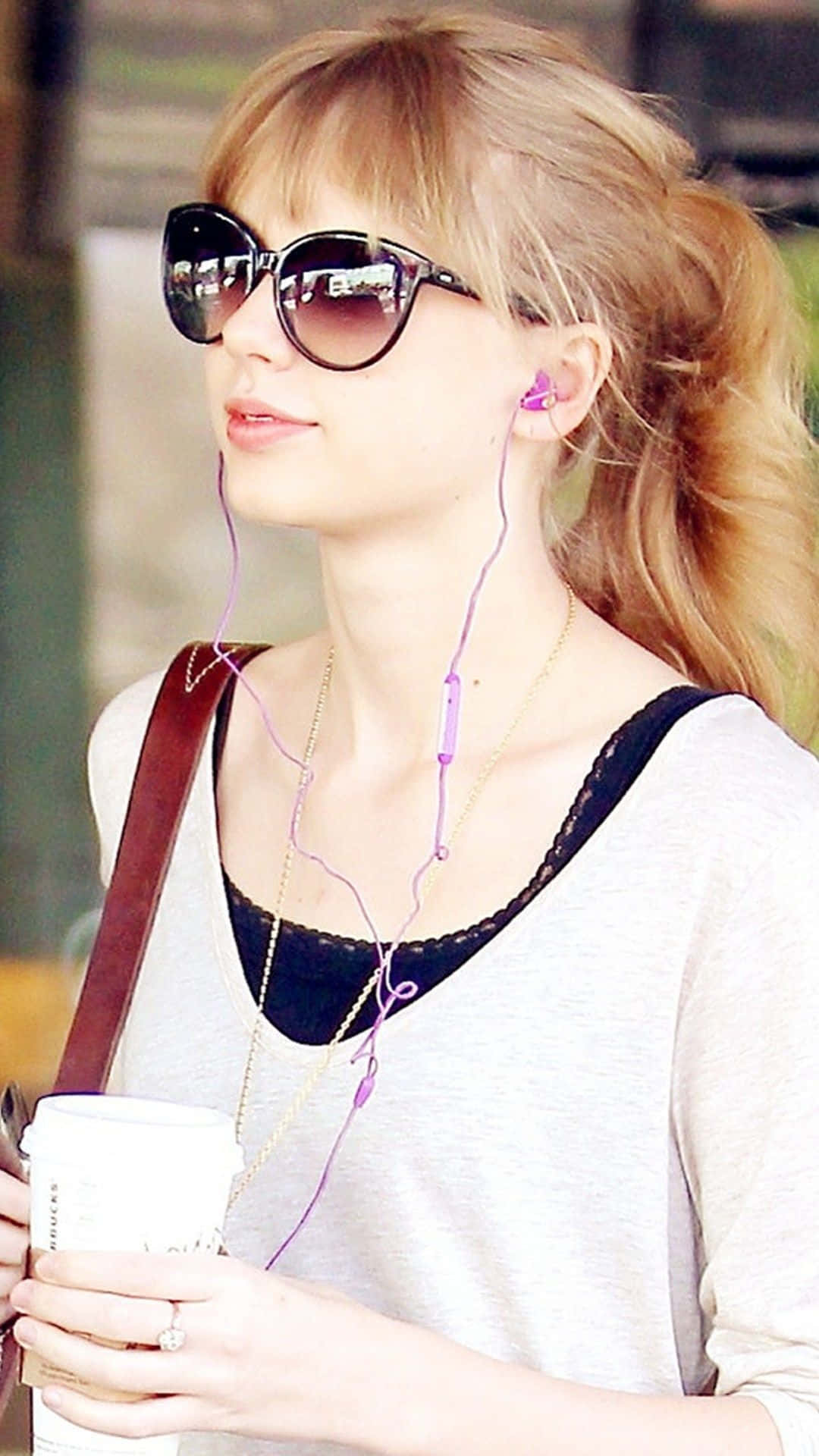 Get The Latest Taylor Swift Albums On Your Iphone Background