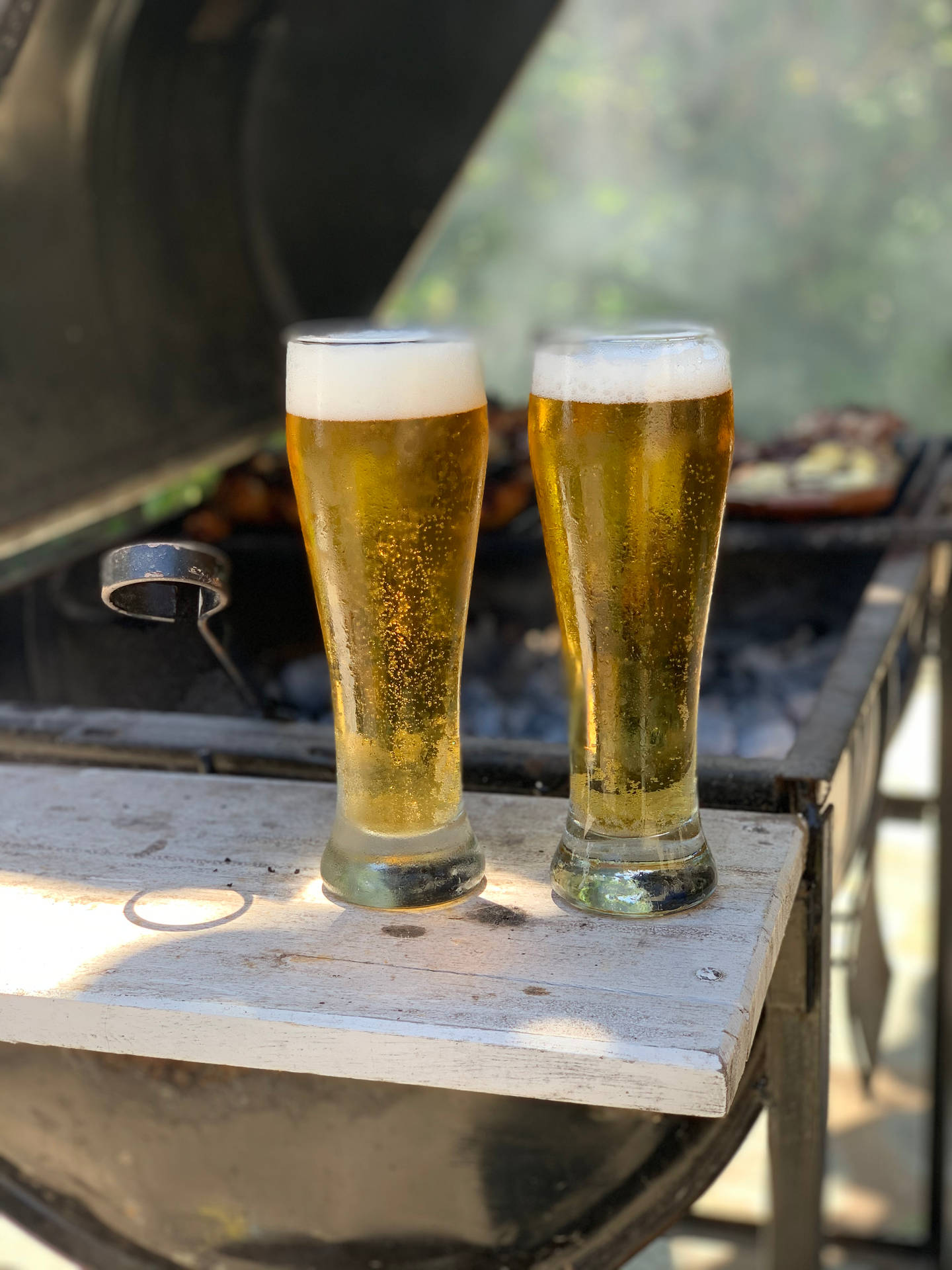 Get The Party Started With An Ice Cold Beer And Delicious Bbq Background