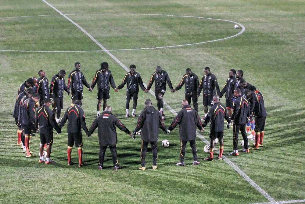 Ghana National Football Team In Circle Background