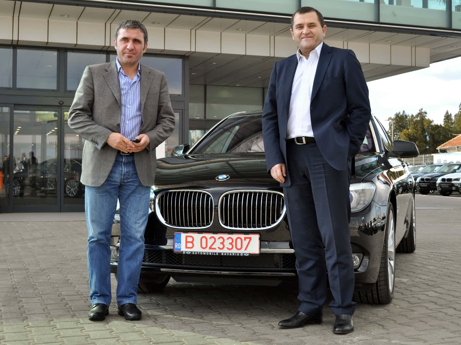 Gheorghe Hagi With A Bmw Car Background