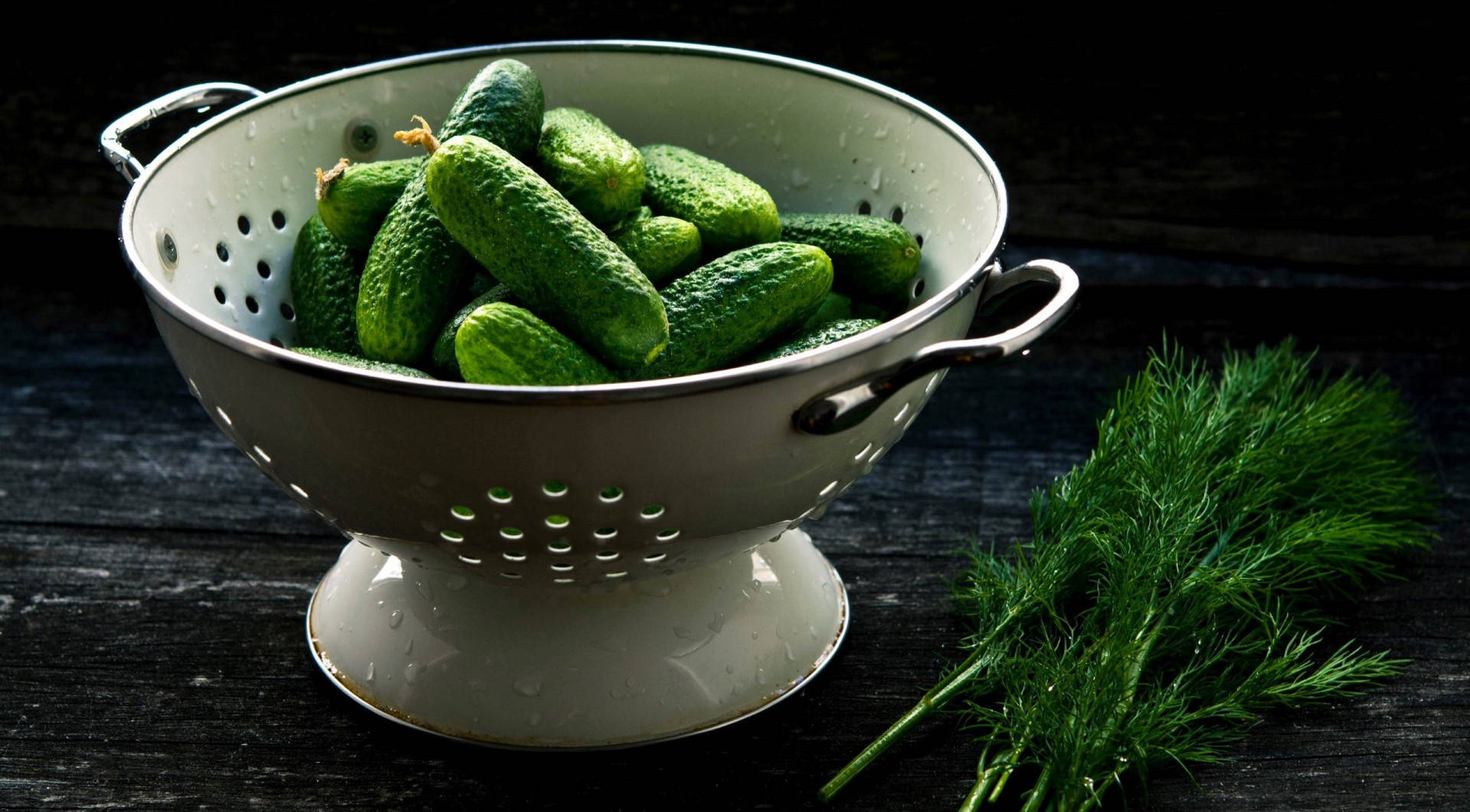 Gherkins On A Colander Background