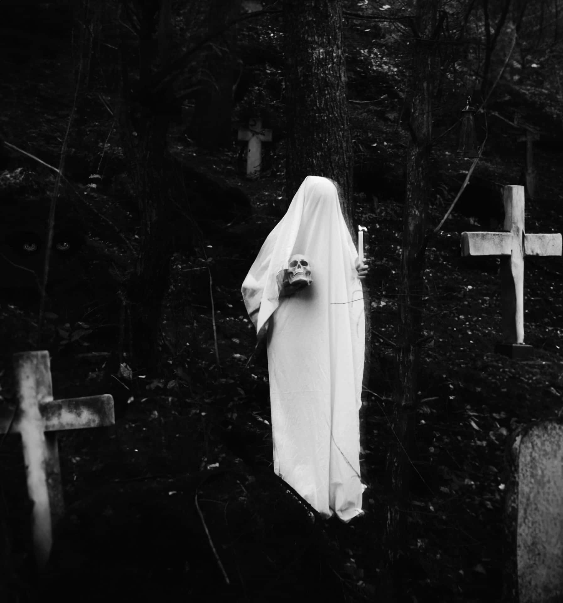 Ghostly Figurein Cemeterywithi Phone Background