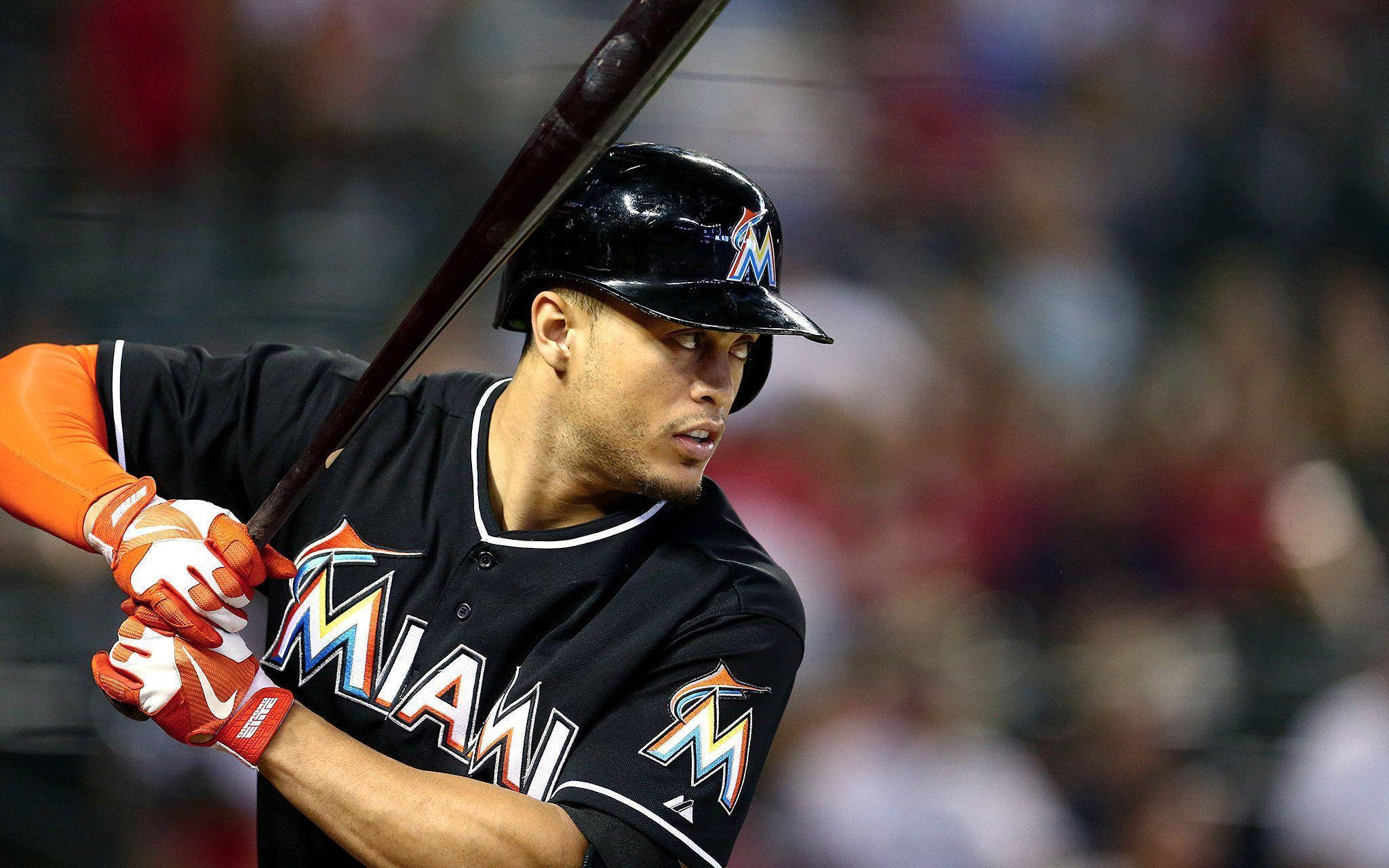 Giancarlo Stanton Dressed In Black Background