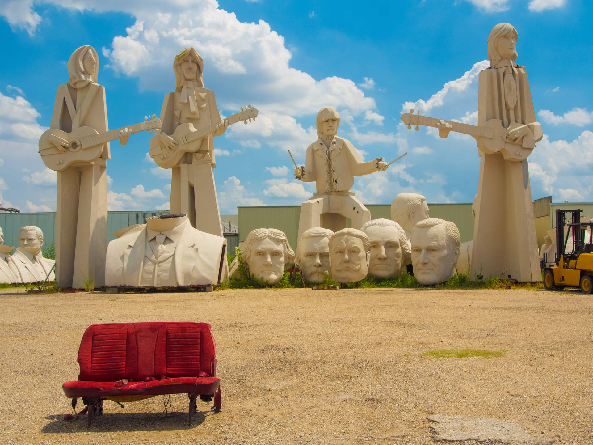 Giant Beatles Statues Houston Background