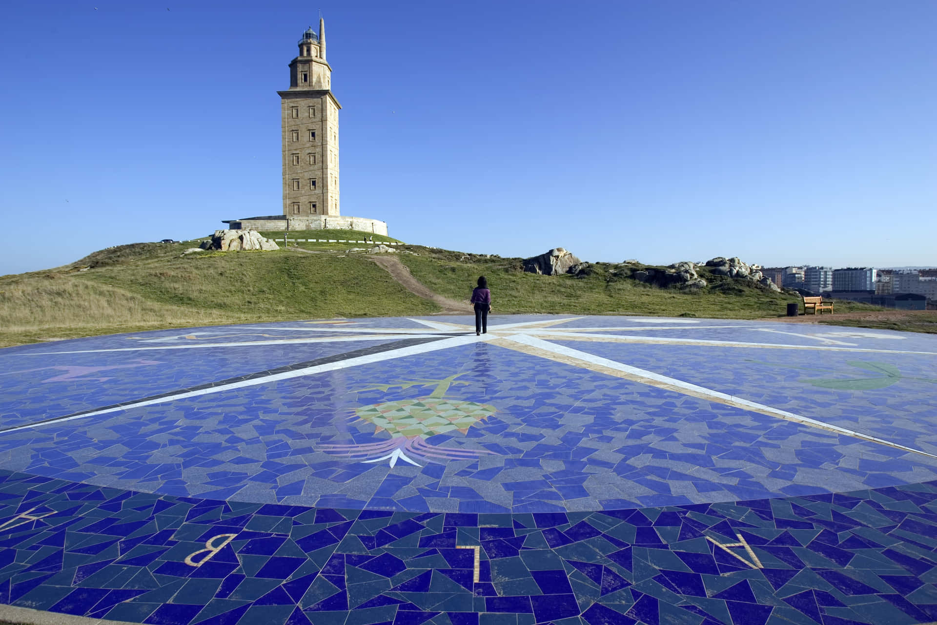 Giant Mosaic Compass Outside The Tower Of Hercules Background
