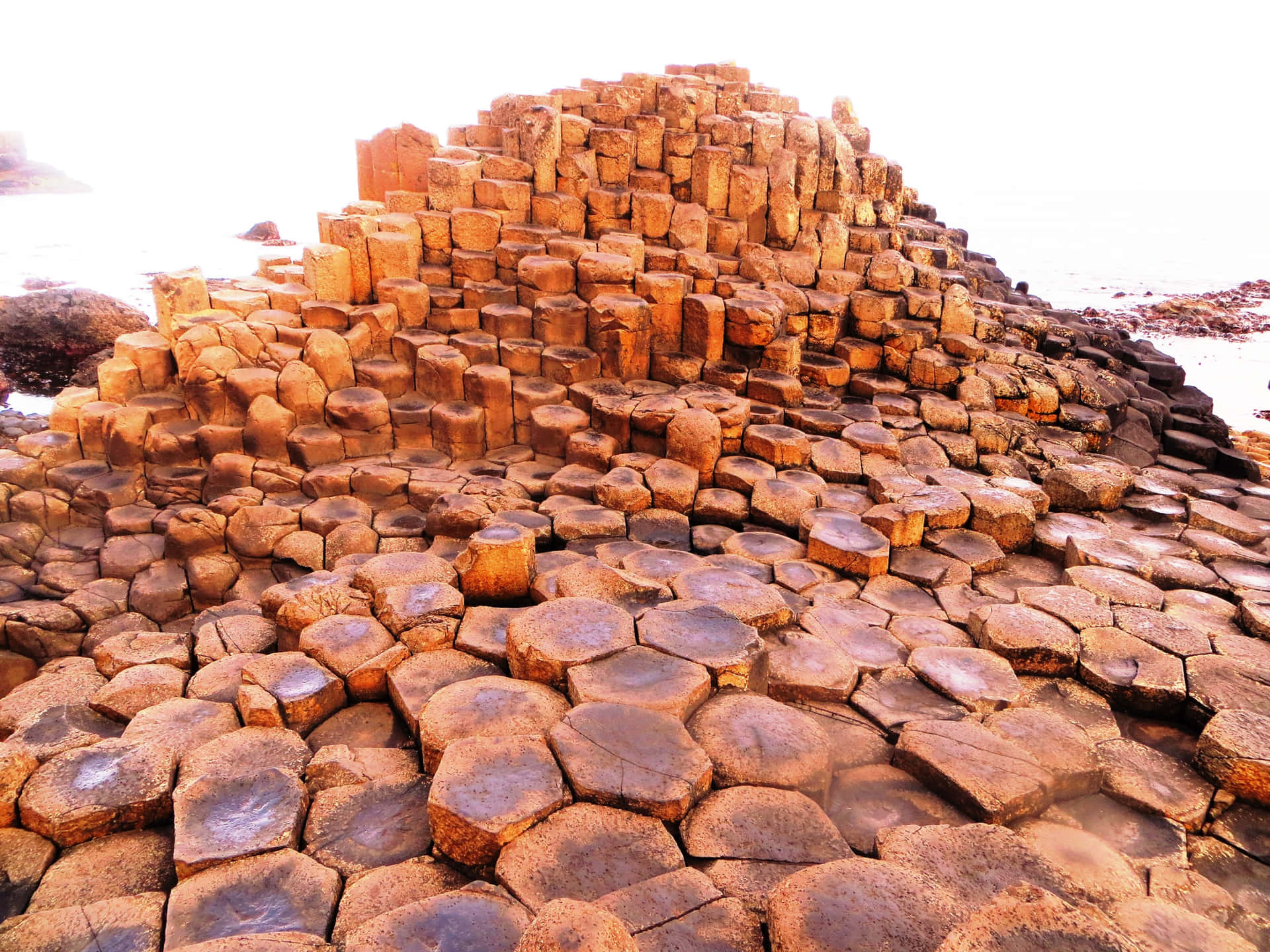 Giant's Causeway Orange Rocks Background