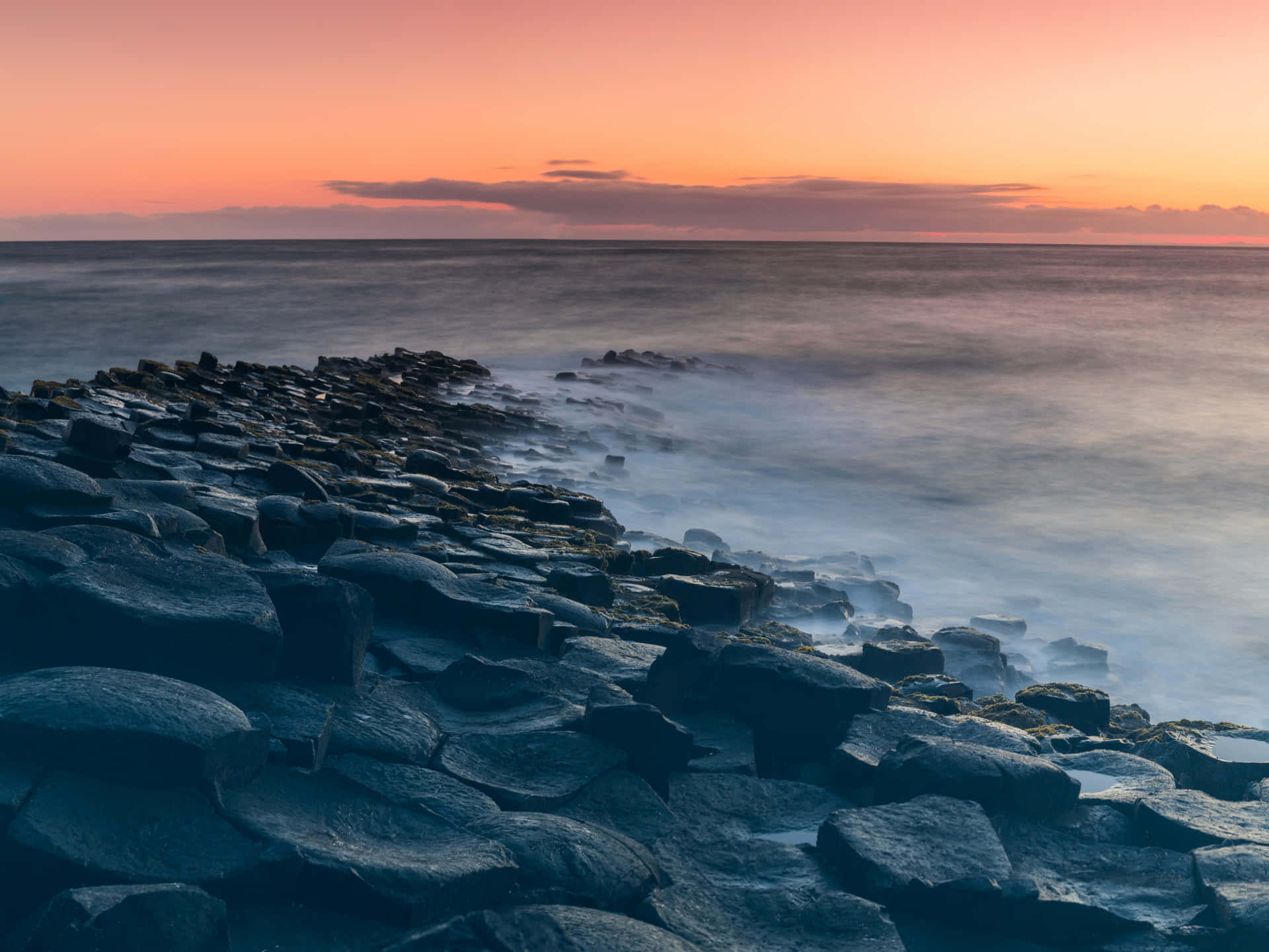 Giant's Causeway Orange Sky Background
