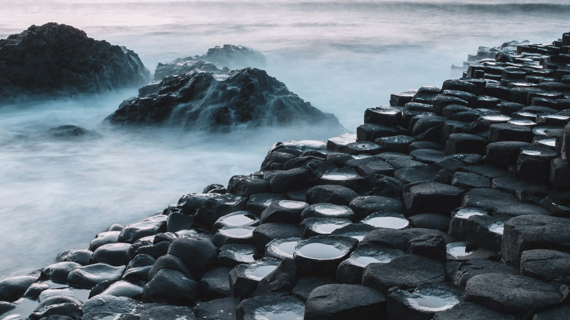 Giant's Causeway Thick Fog In Northern Ireland Background