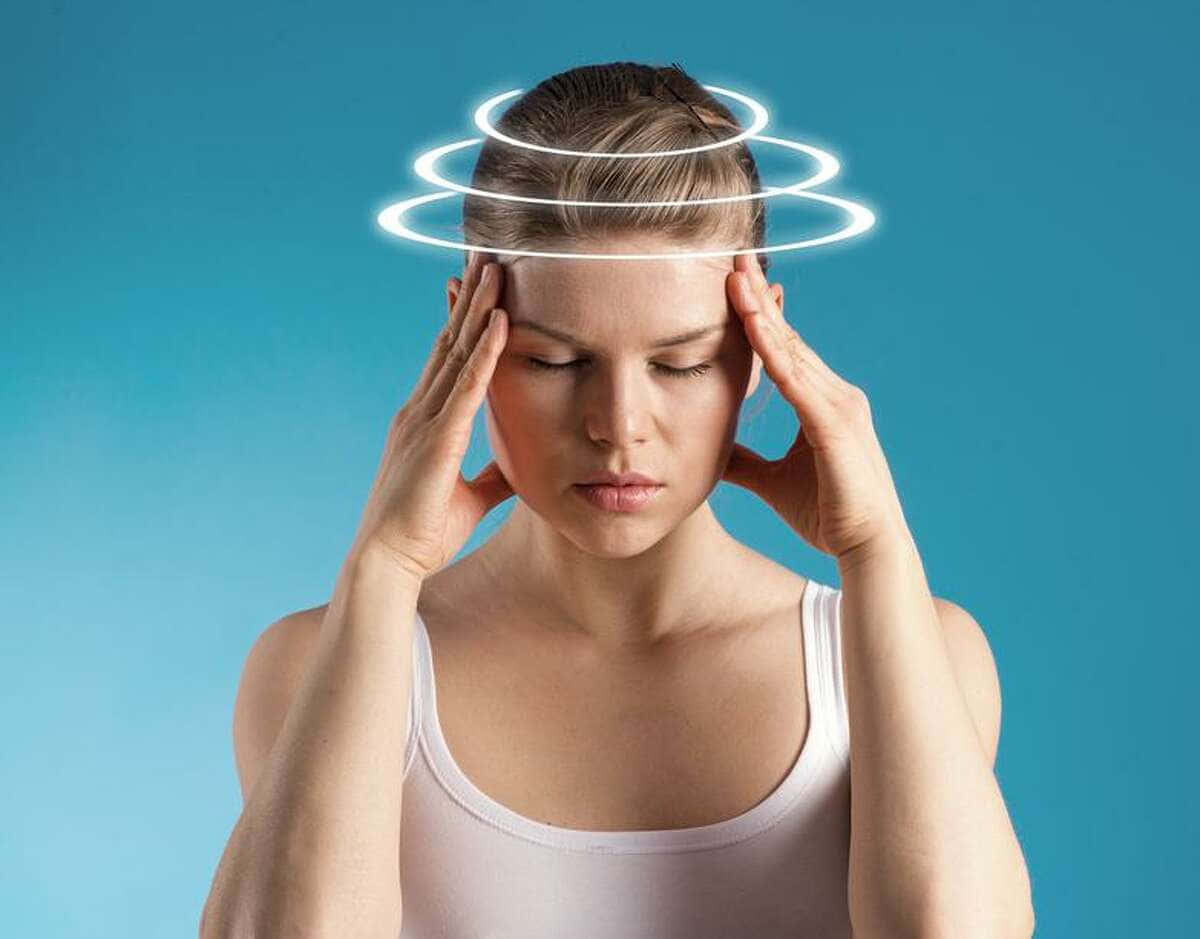 Giddy Woman With Tension Headache Background