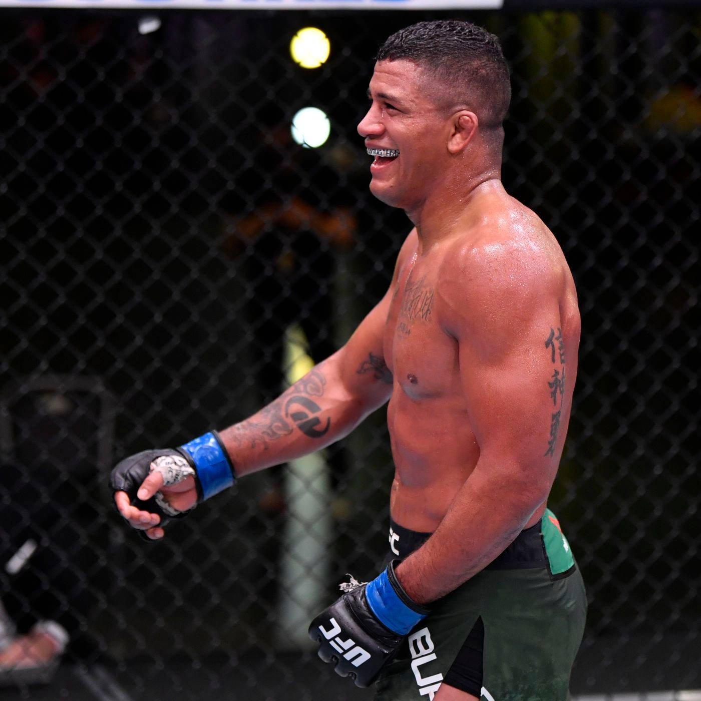 Gilbert Burns Smiling Side View Background