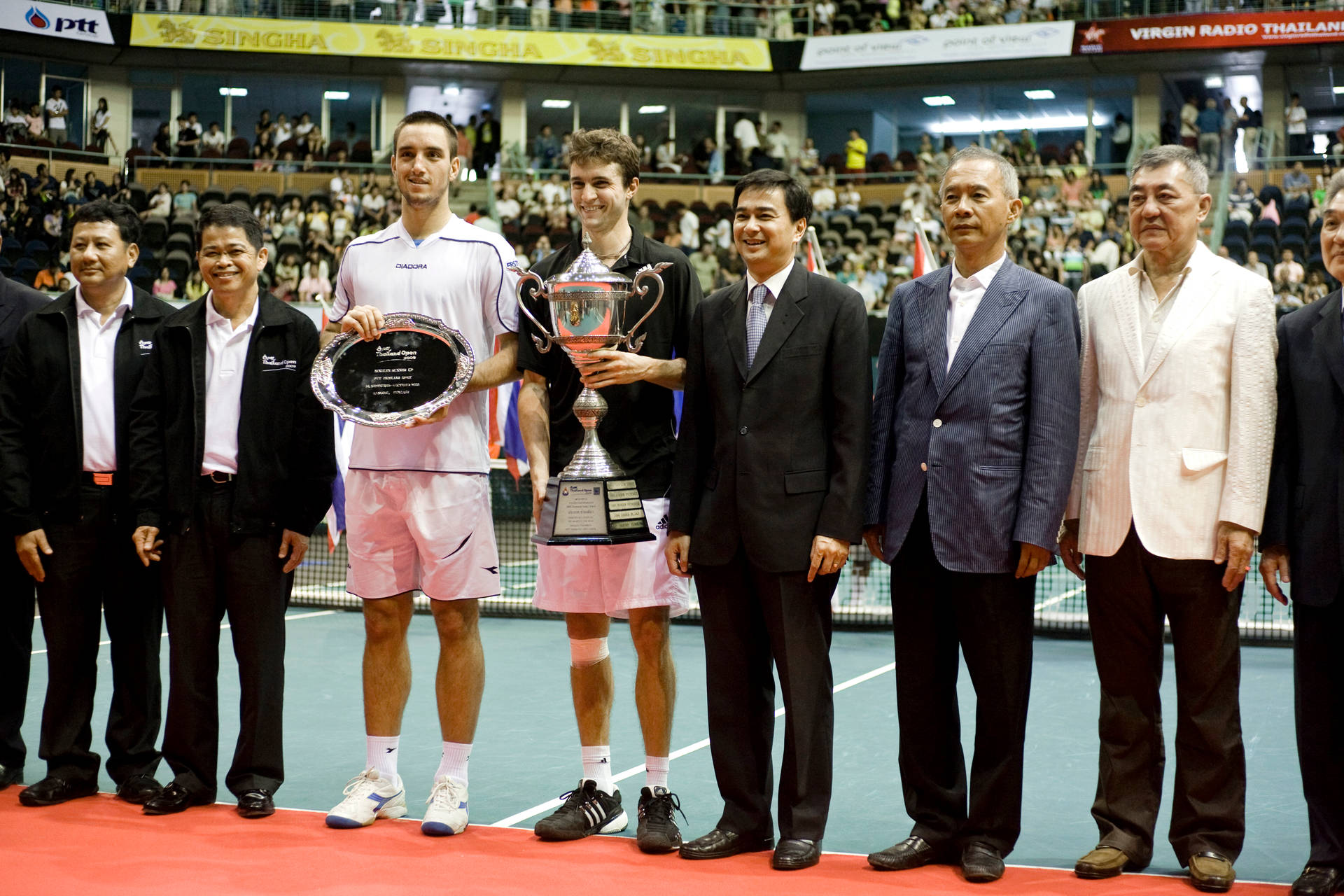 Gilles Simon Posing After Win Background