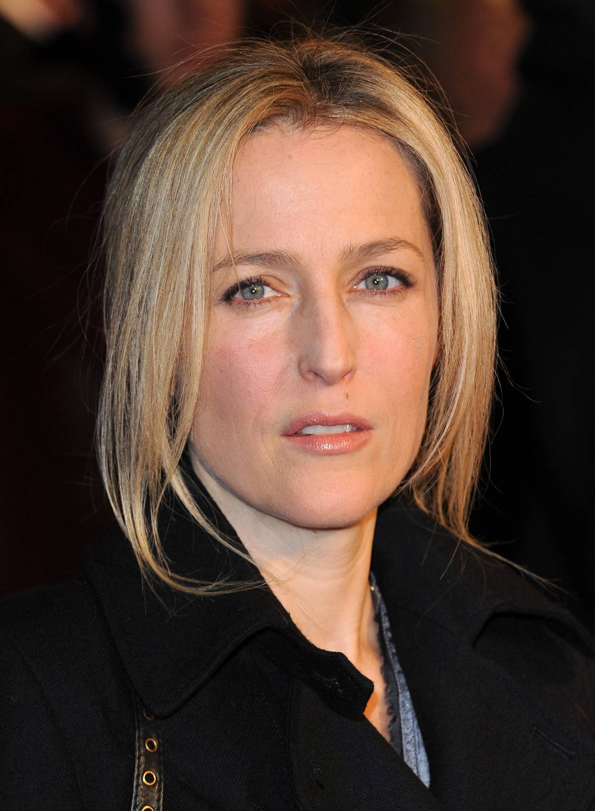 Gillian Anderson Solemn Face Background
