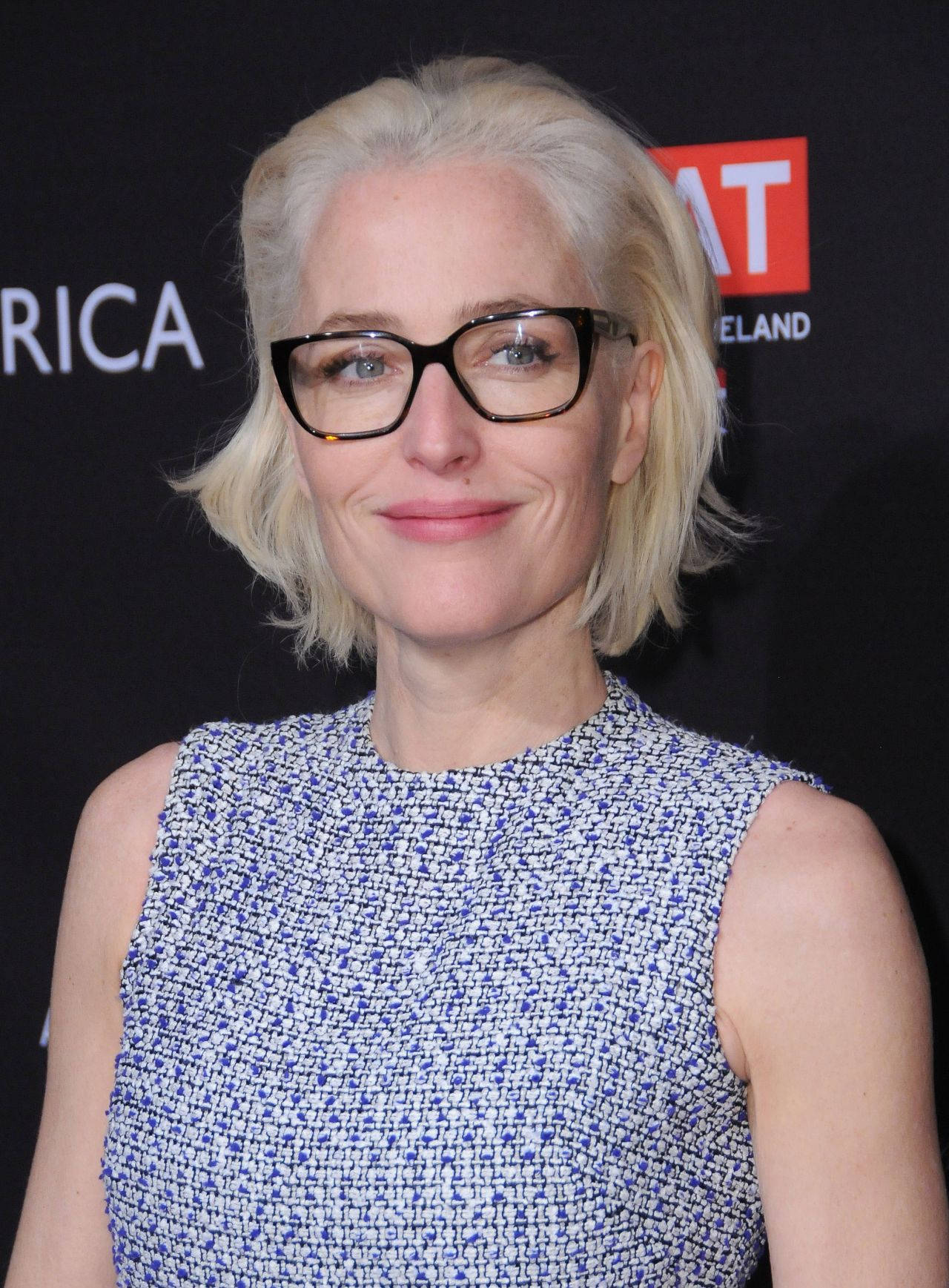 Gillian Anderson Wearing Glasses Background