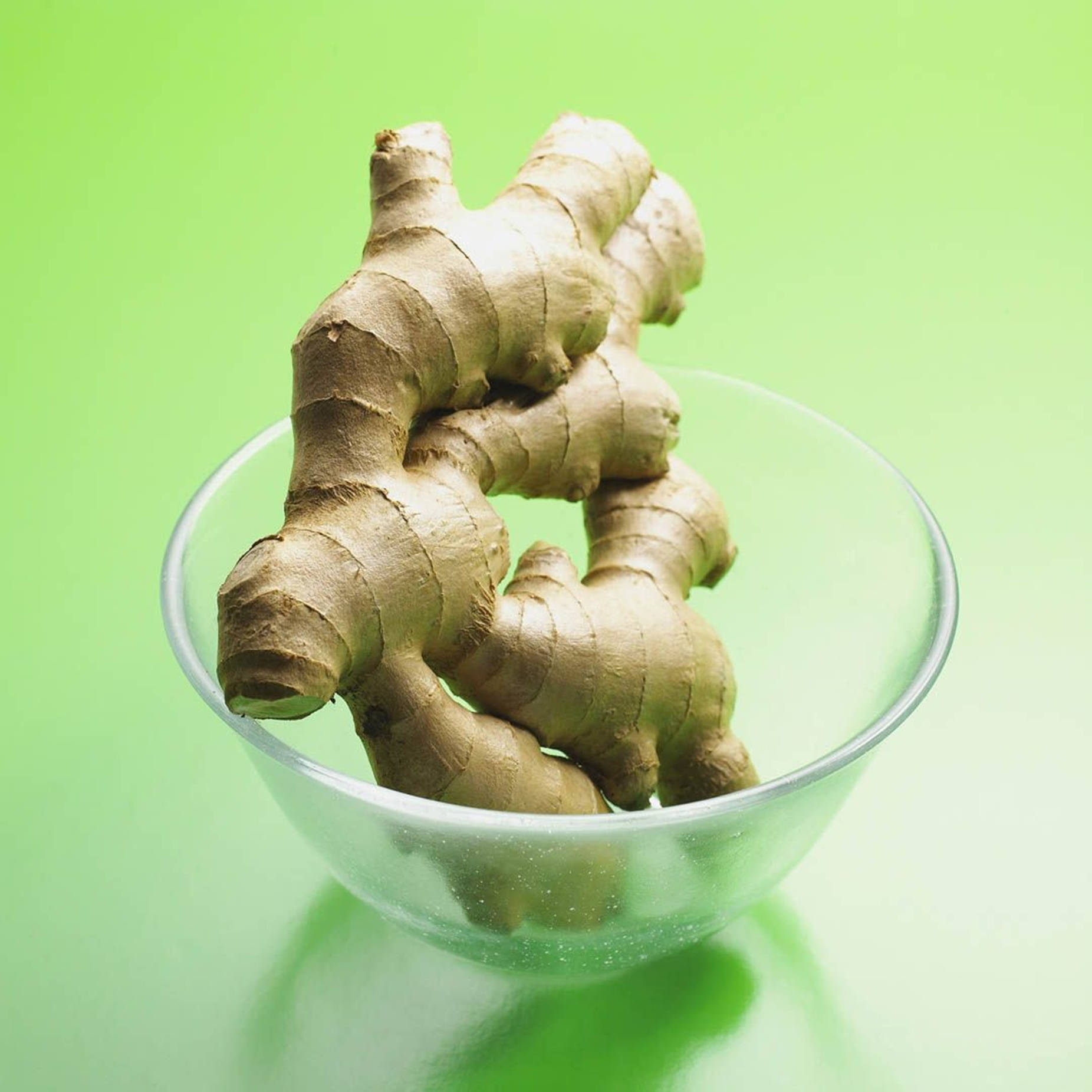 Ginger Root Vegetable In Glass Bowl Background