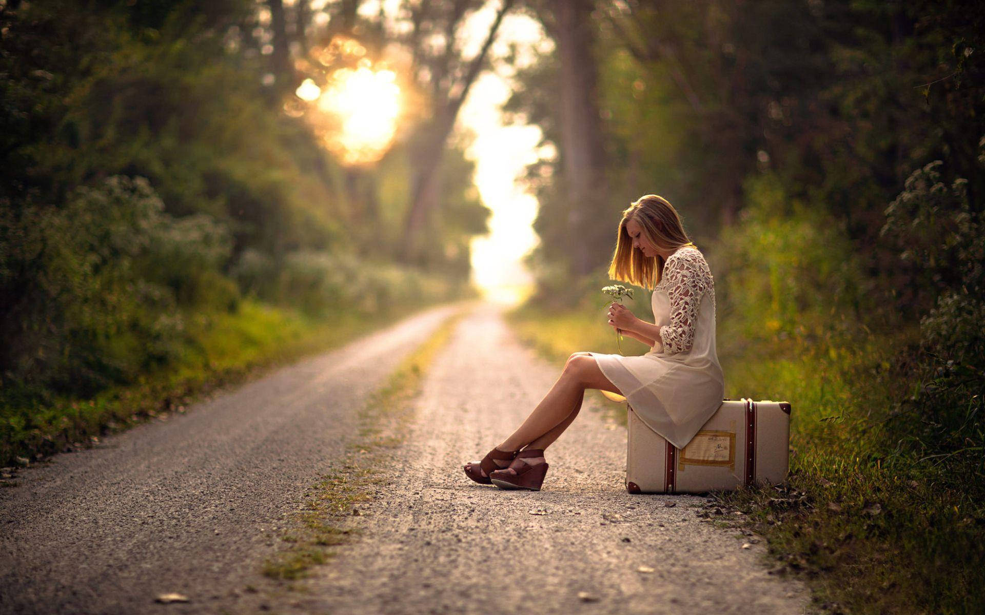 Girl Alone On Luggage