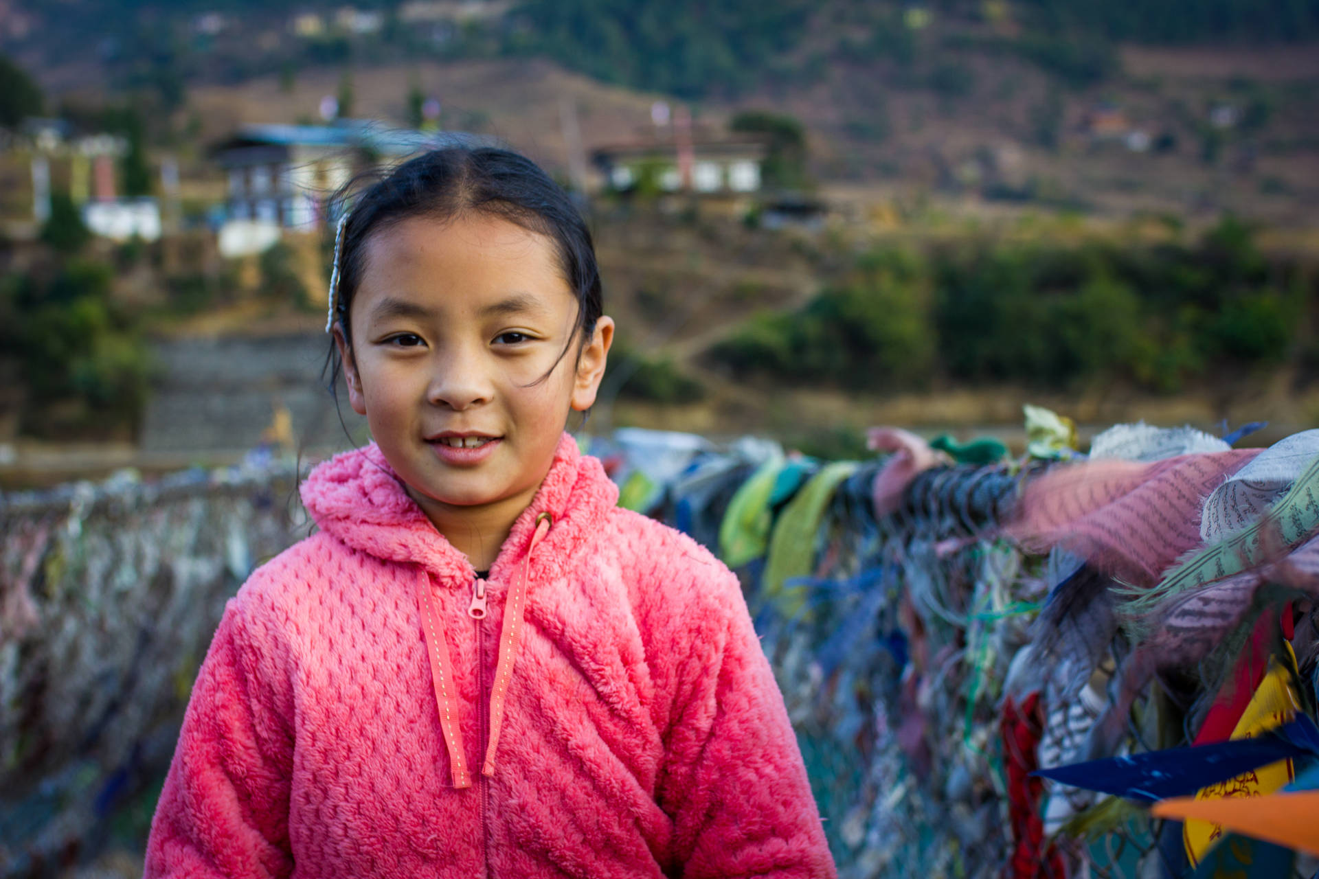 Girl At Bhutan Suspension Bridge Background