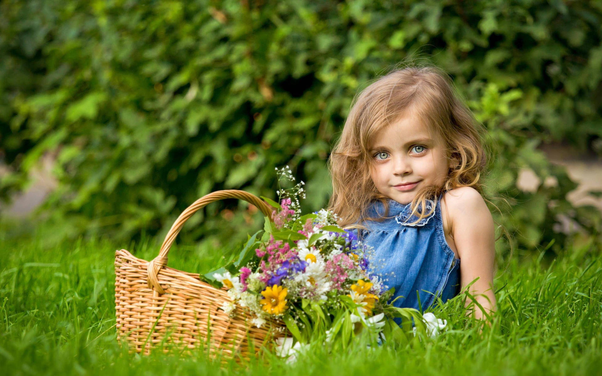 Girl Child Holding A Basket In The Grass