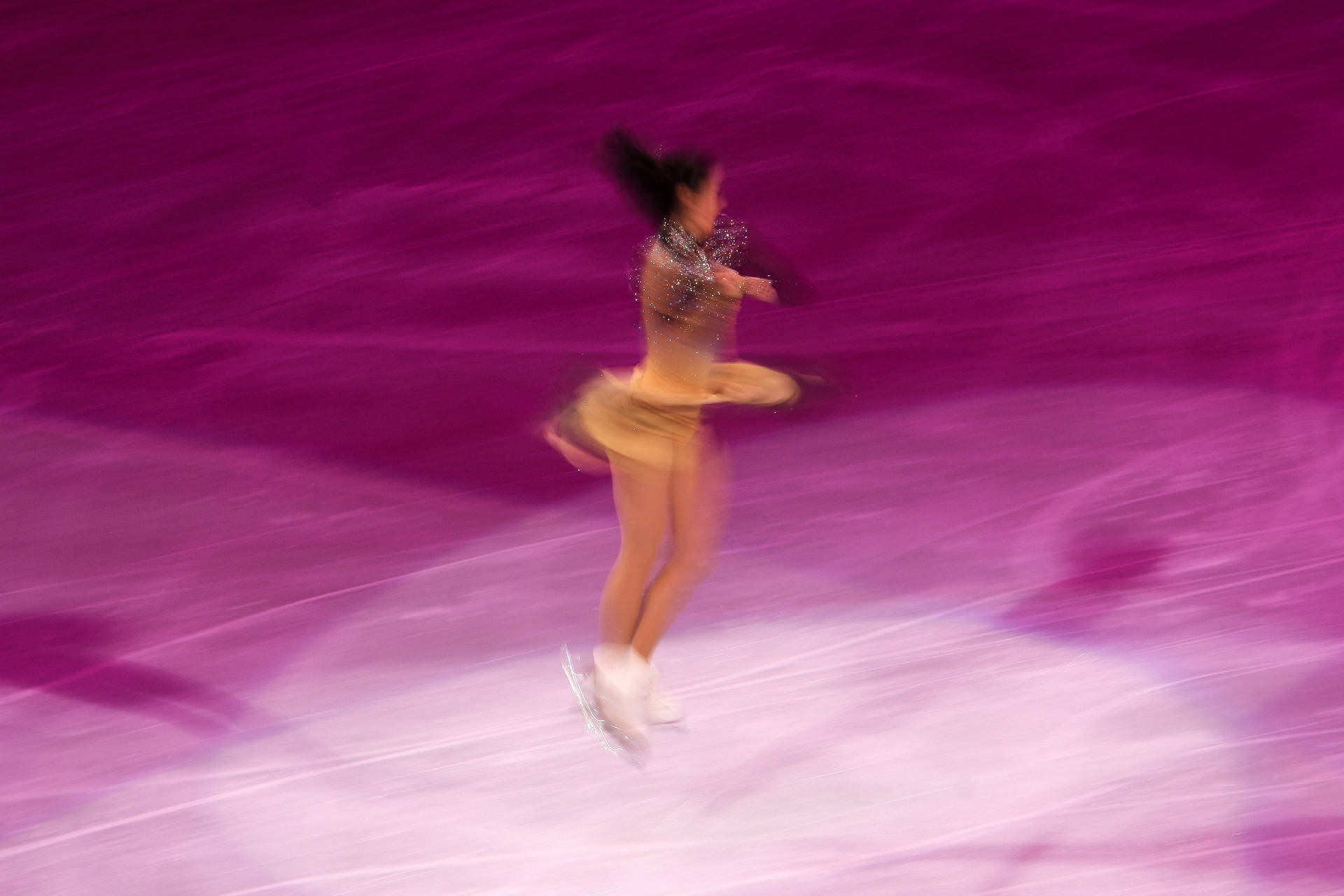 Girl Ice Skating In Exquisite Movement