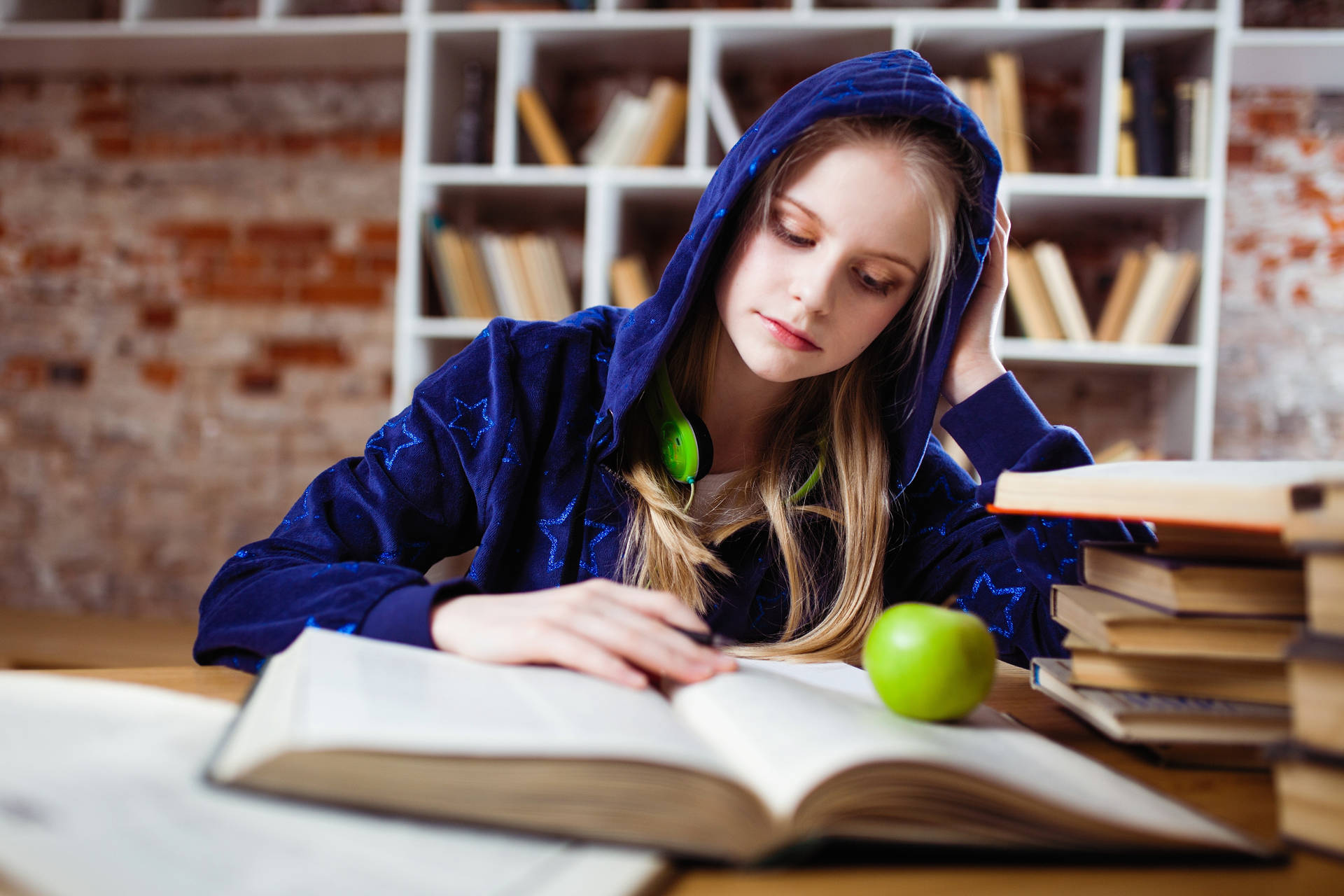 Girl In Hoodie Learning With Apple Background