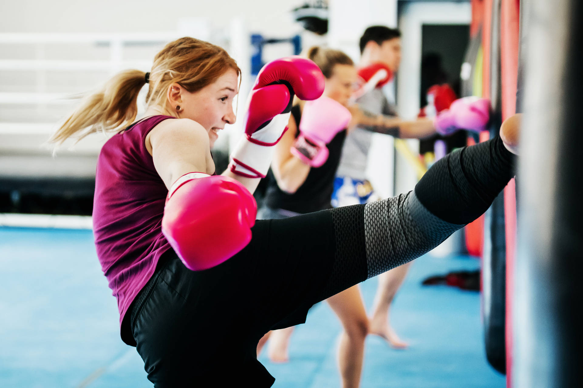 Girl Kickboxing Training At A Gym