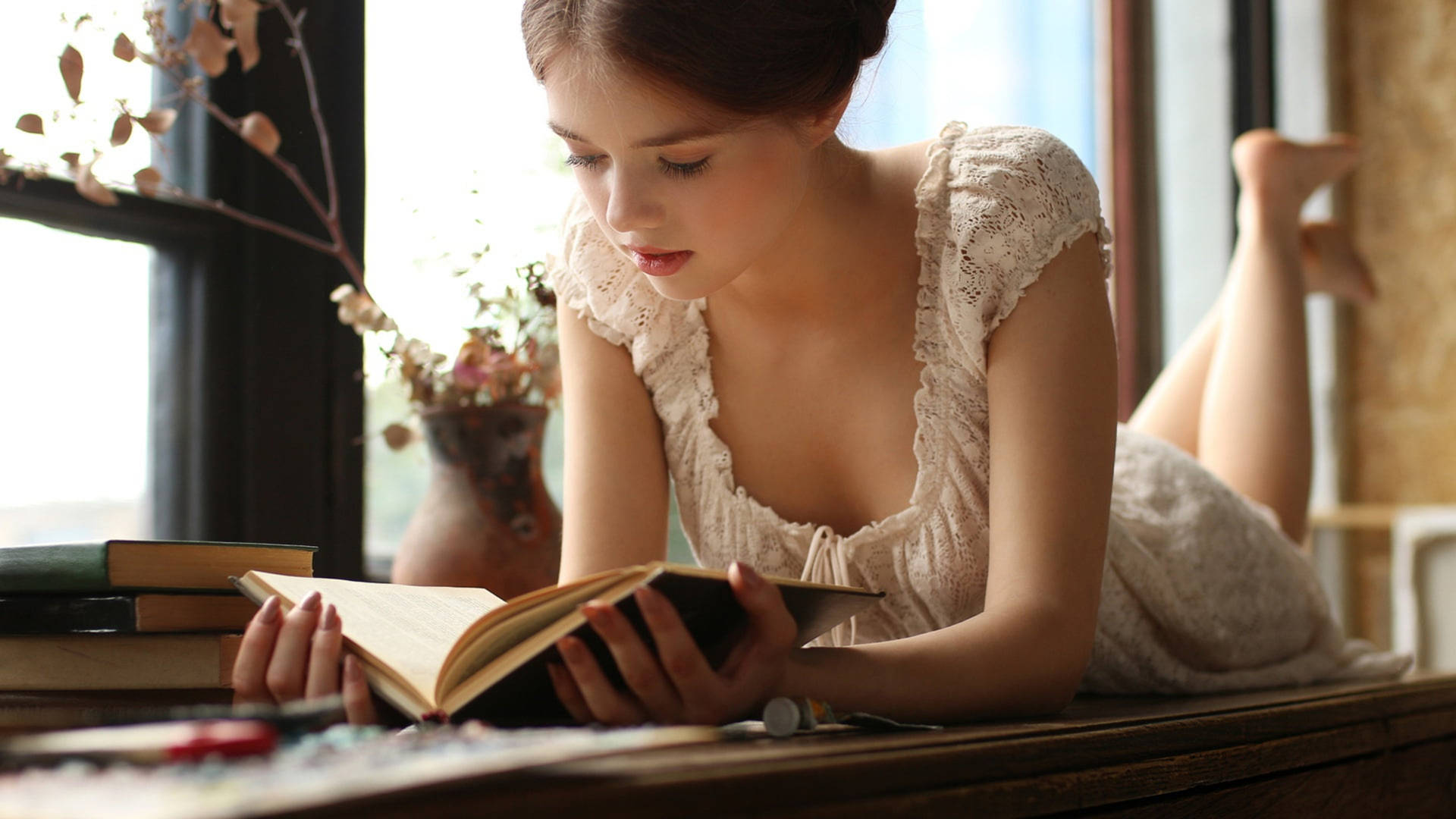 Girl Reading Books Near Window Background