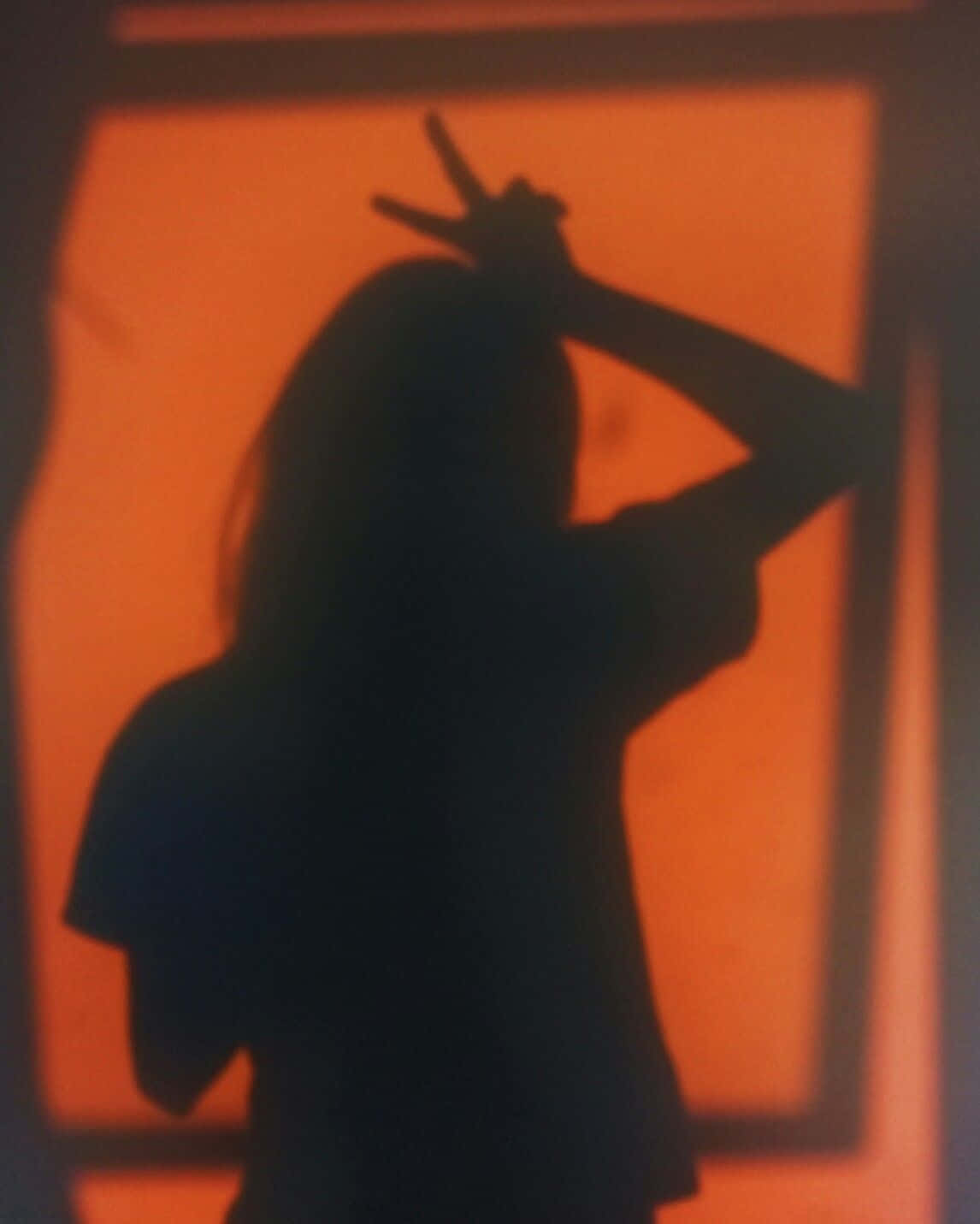 Girl's Orange Shadow Pfp Background