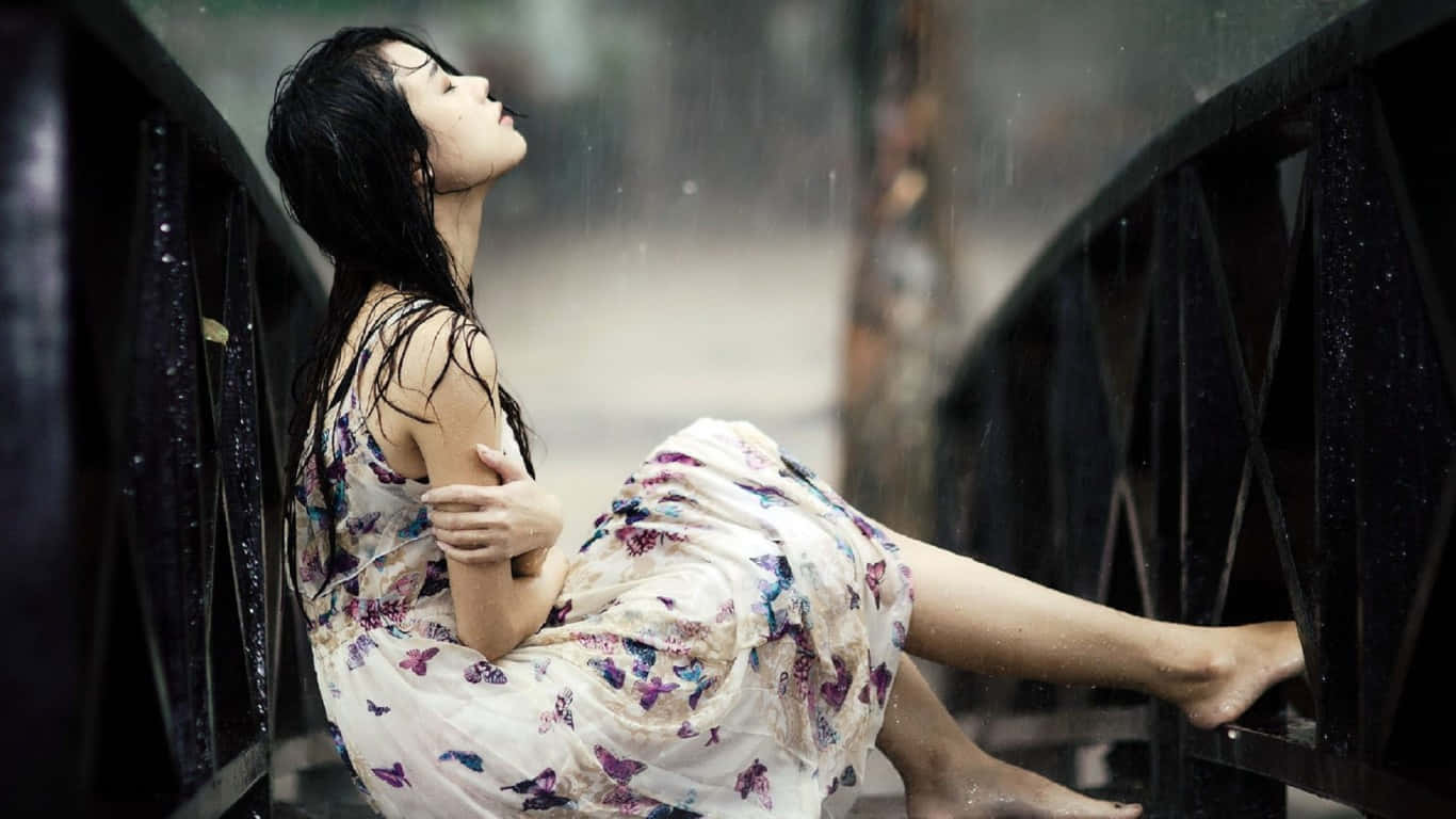 Girl Sitting Alone Crying In Rain