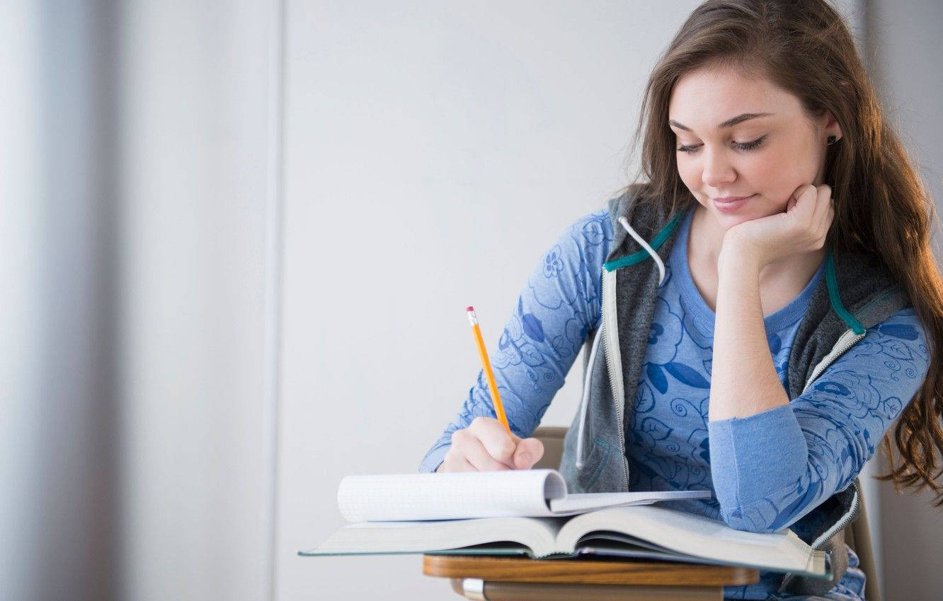 Girl Smiling While Studying Background