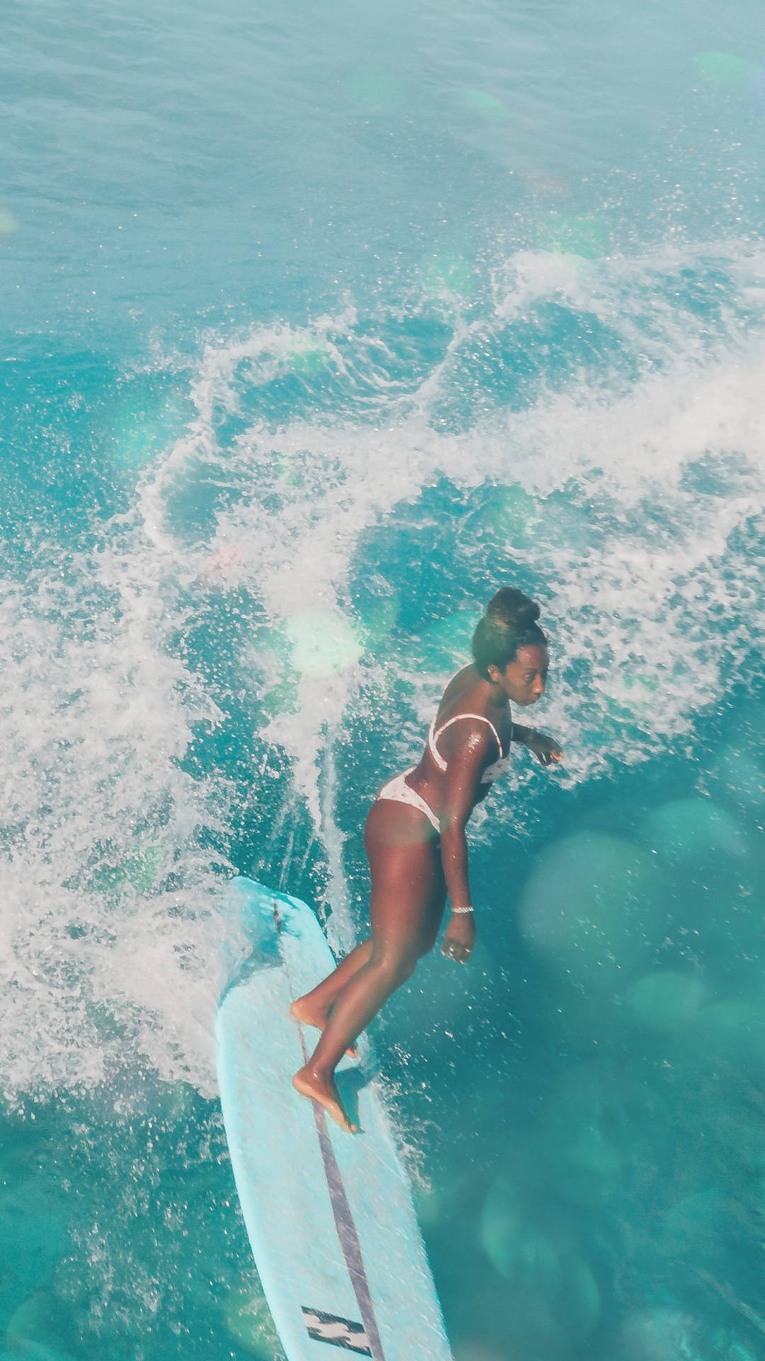 Girl Surfing On Blue Board