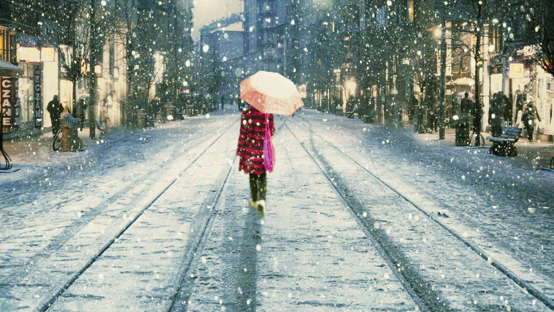 Girl Walking On Snowfall Background