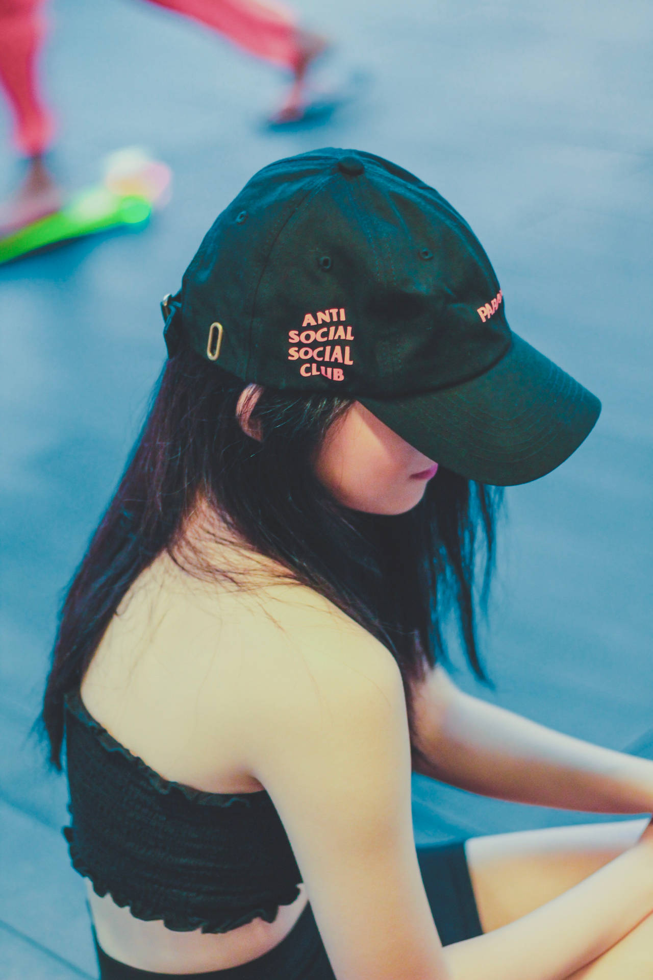 Girl Wearing Anti Social Social Club Cap Background