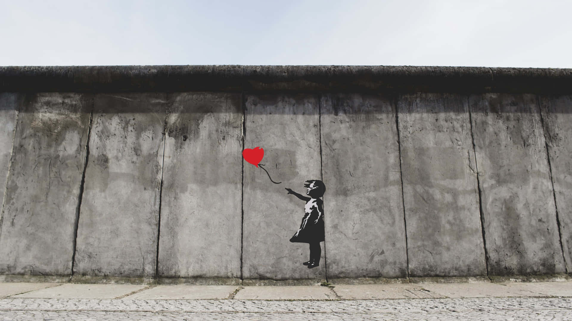Girl With Balloon In Berlin Wall Background