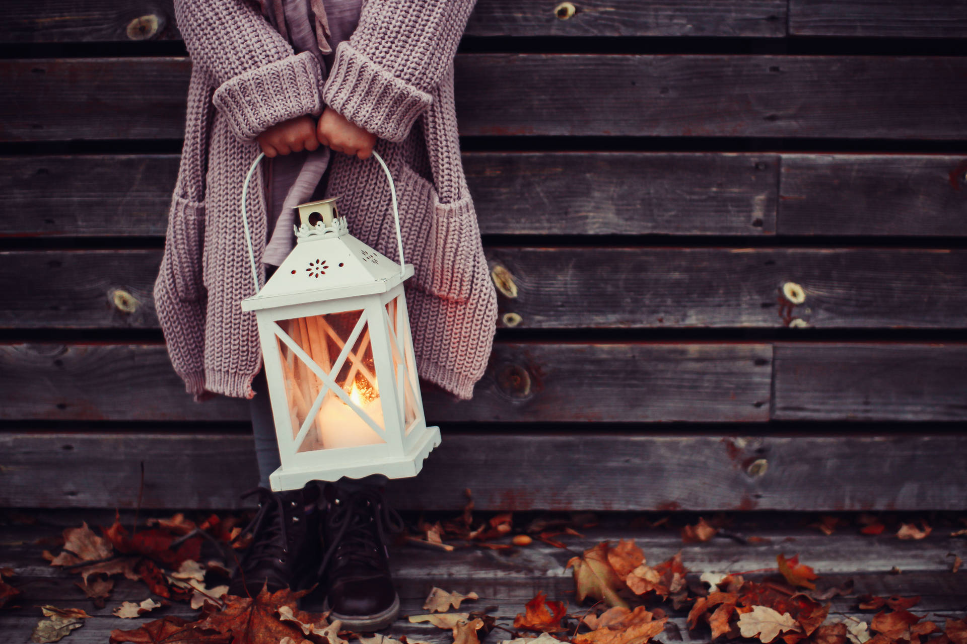 Girl With Candle Lantern Autumn Background