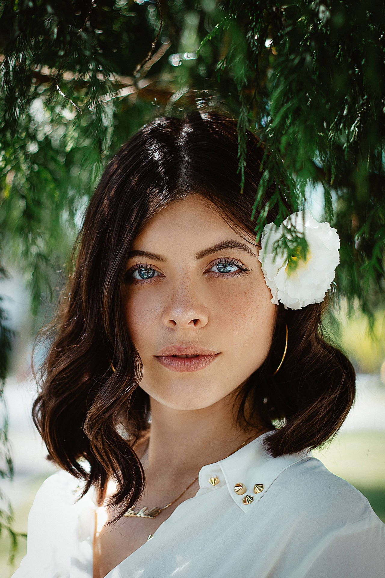 Girl With Flower On Her Ear Headshot