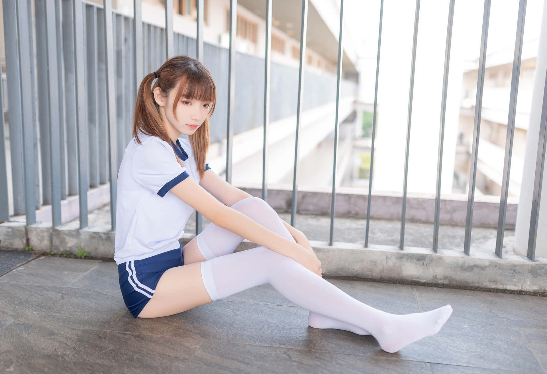 Girl With Pigtails Wearing Thigh Highs Background