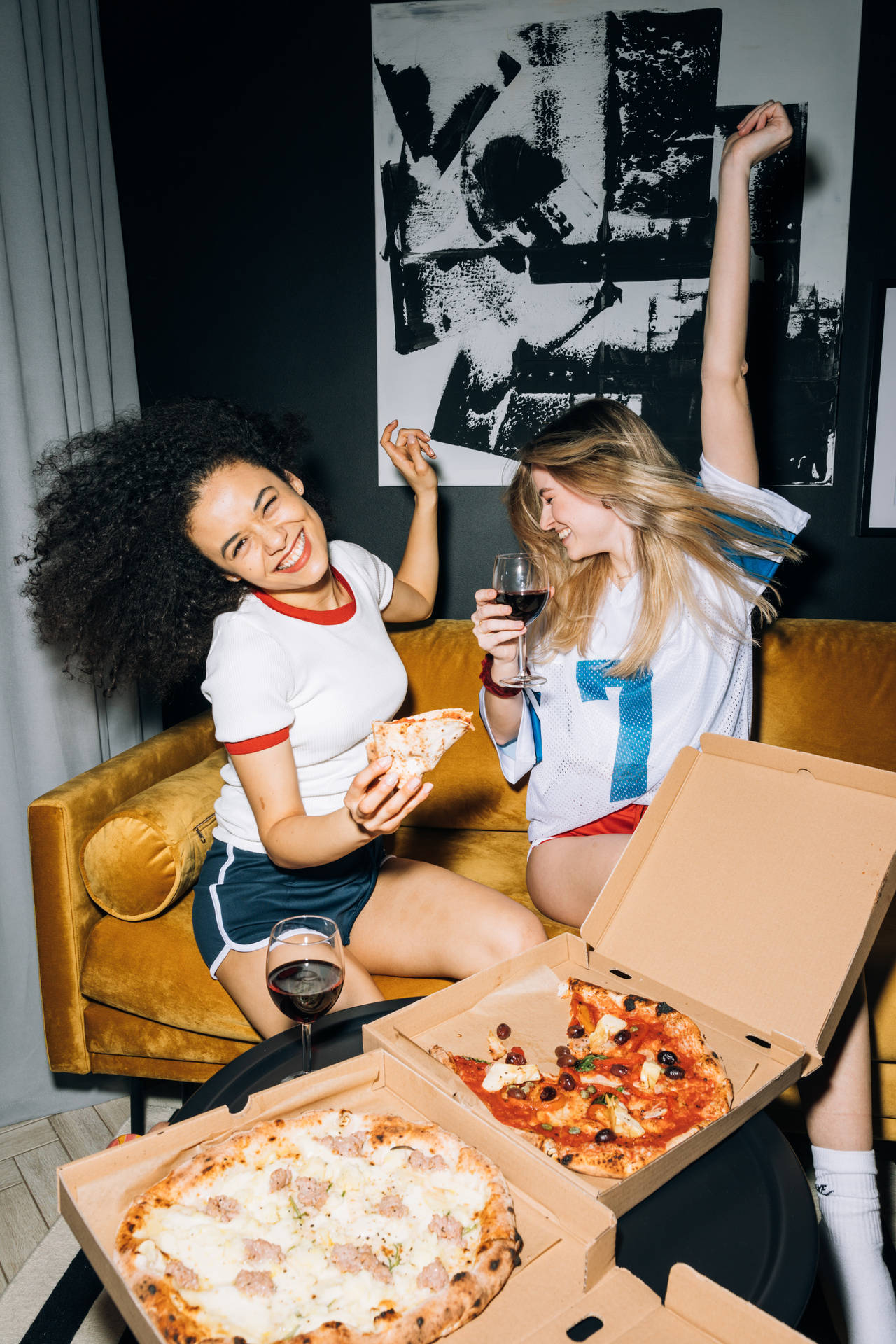 Girls Having Fun Eating Dominos Pizza Background