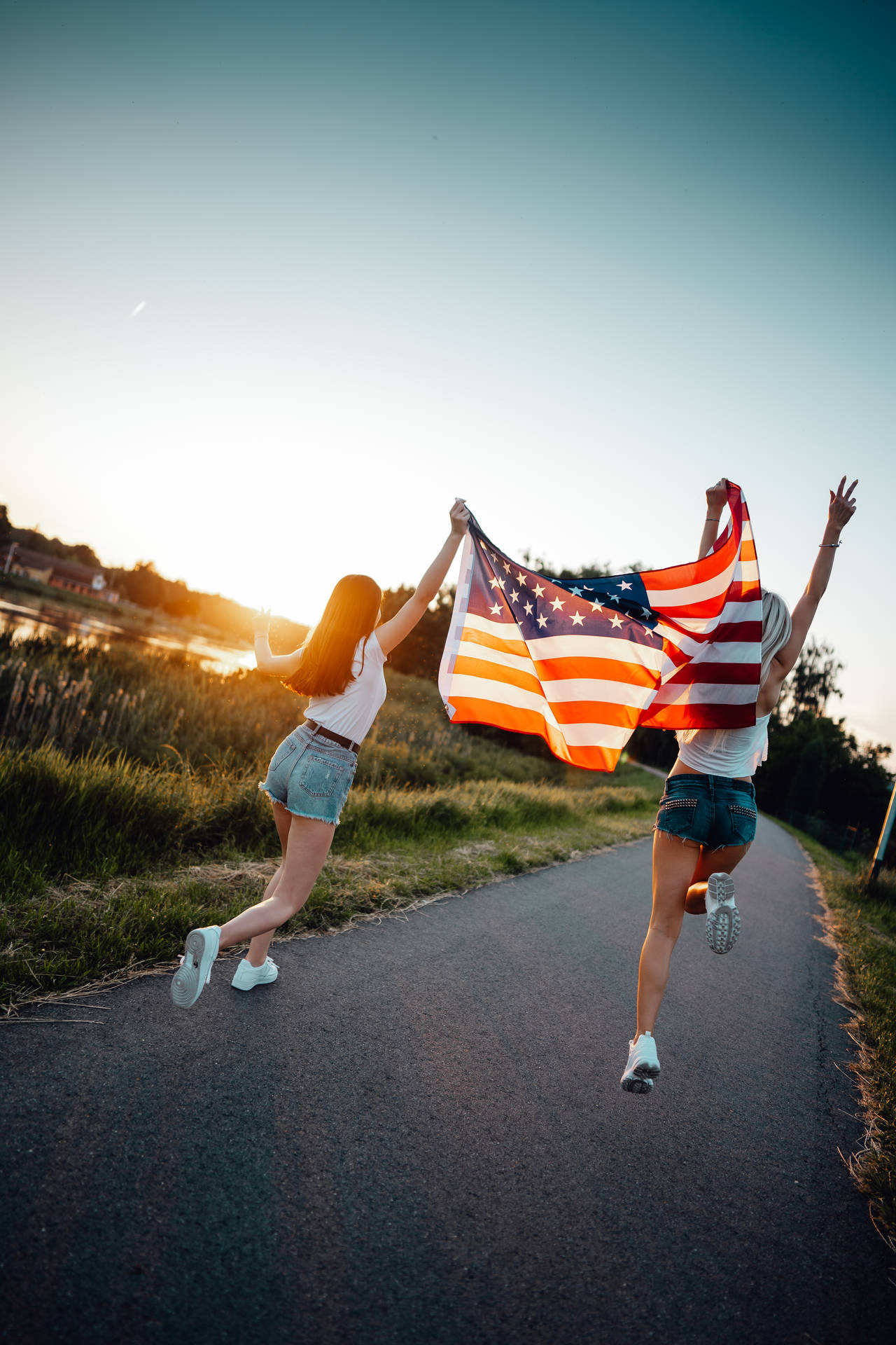 Girls Jumping With American Flag Iphone Background
