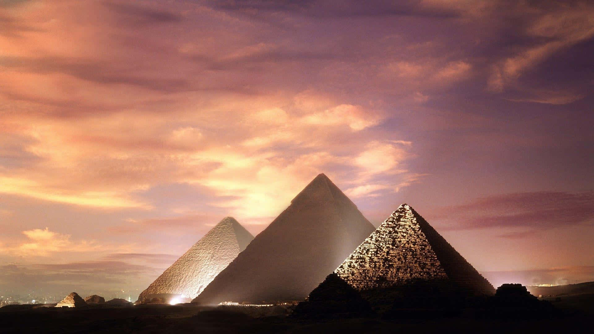 Giza Pyramids At Dusk Background
