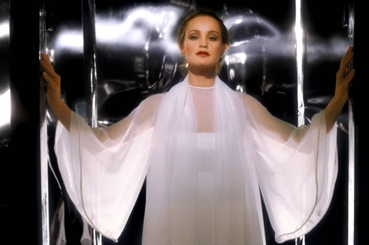 Glamorous Jessica Lange Dressed In White Background