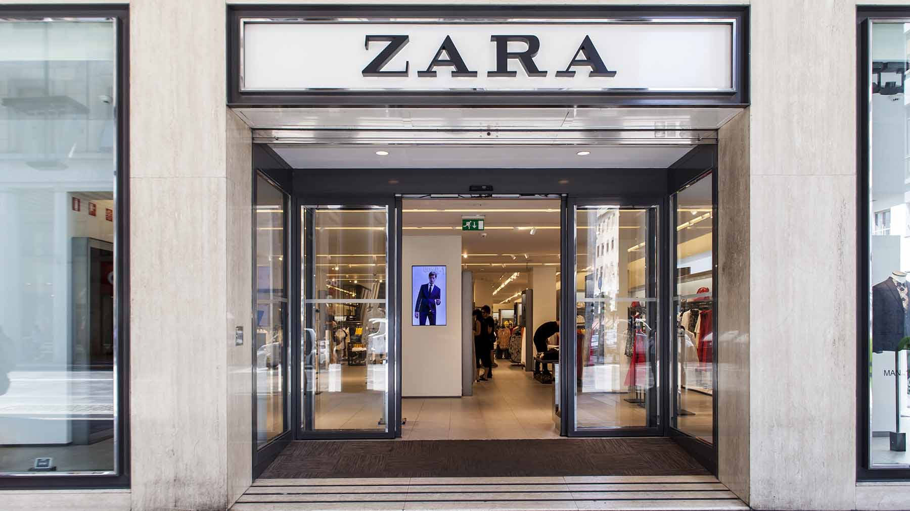 Glamorous Zara Clothing On Display Background
