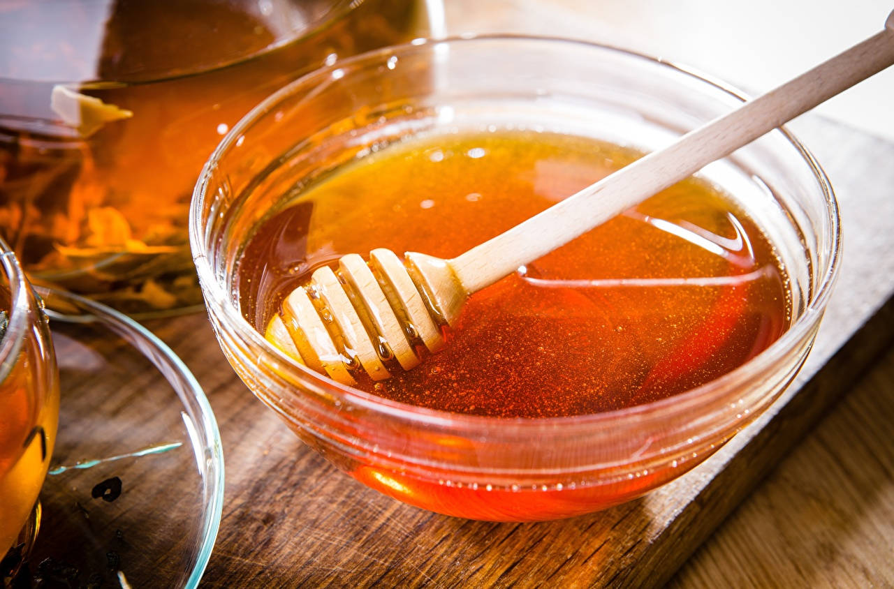 Glass Bowl Of Honey Background